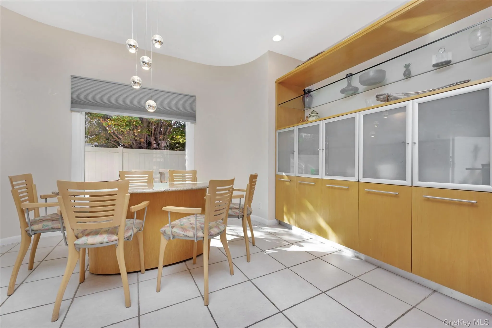 Dining room featuring light tile patterned floors Dining room featuring light tile patterned floors