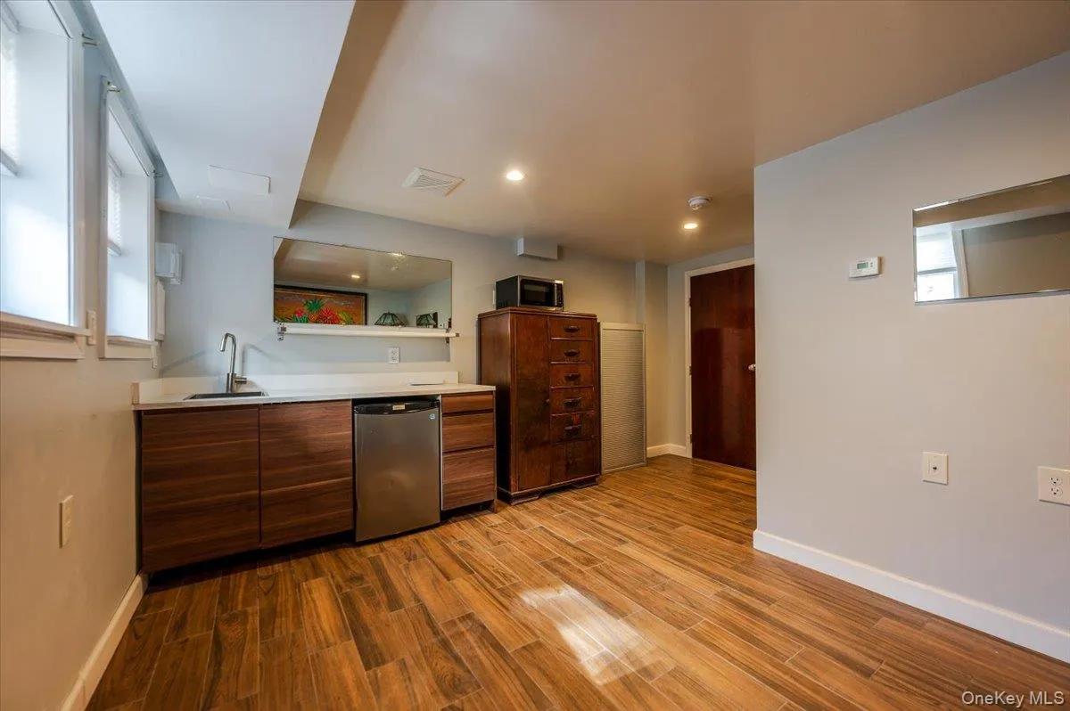 Possible Summer Kitchen/Wet Bar featuring a sink, and dishwasher Possible Summer Kitchen/Wet Bar featuring a sink, and dishwasher