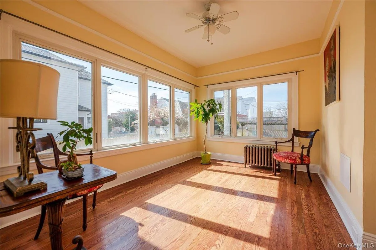 Main floor Studio/Bedroom/Sunroom with ceiling fan Main floor Studio/Bedroom/Sunroom with ceiling fan