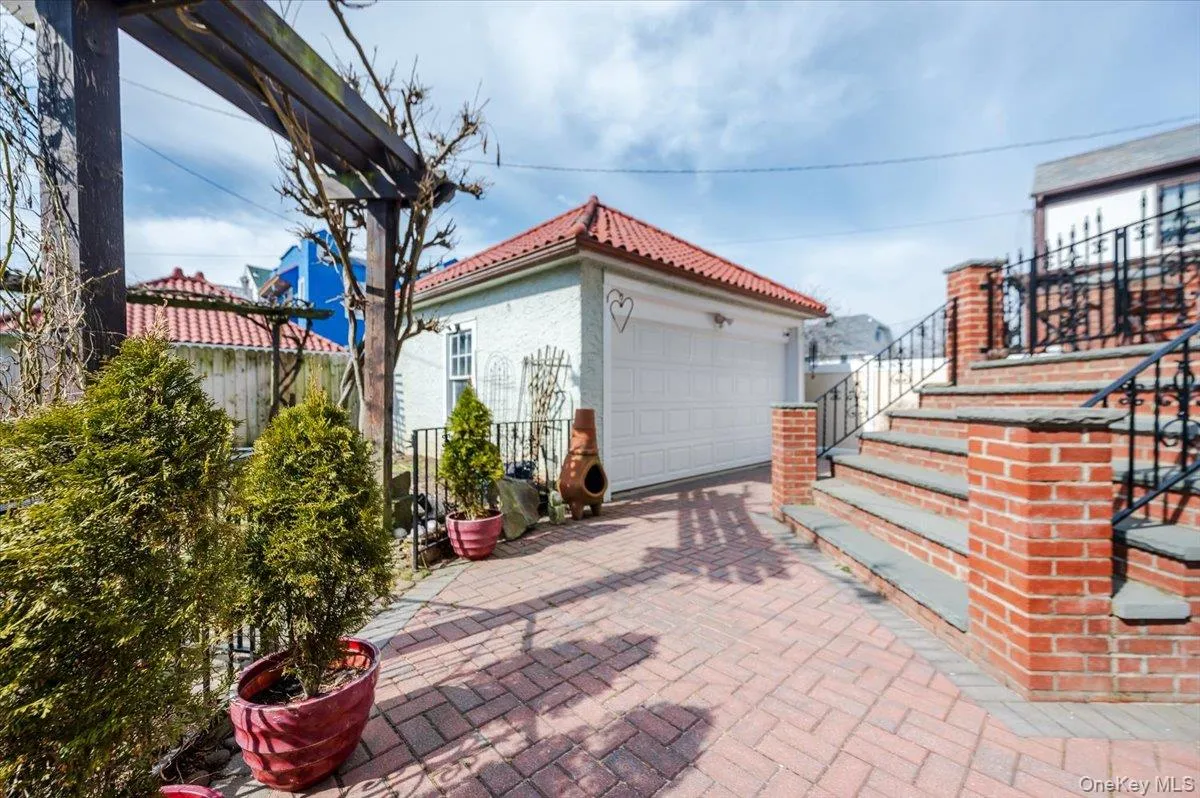 Large Detached 2 Car Garage with long private driveway and access to patios and garden. Large Detached 2 Car Garage with long private driveway and access to patios and garden.
