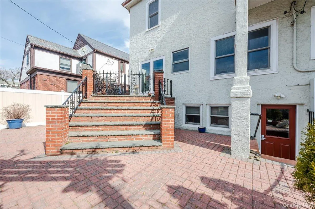 Lower Patio leading to Garden/Yard, Garage, Garden level/basement Lower Patio leading to Garden/Yard, Garage, Garden level/basement