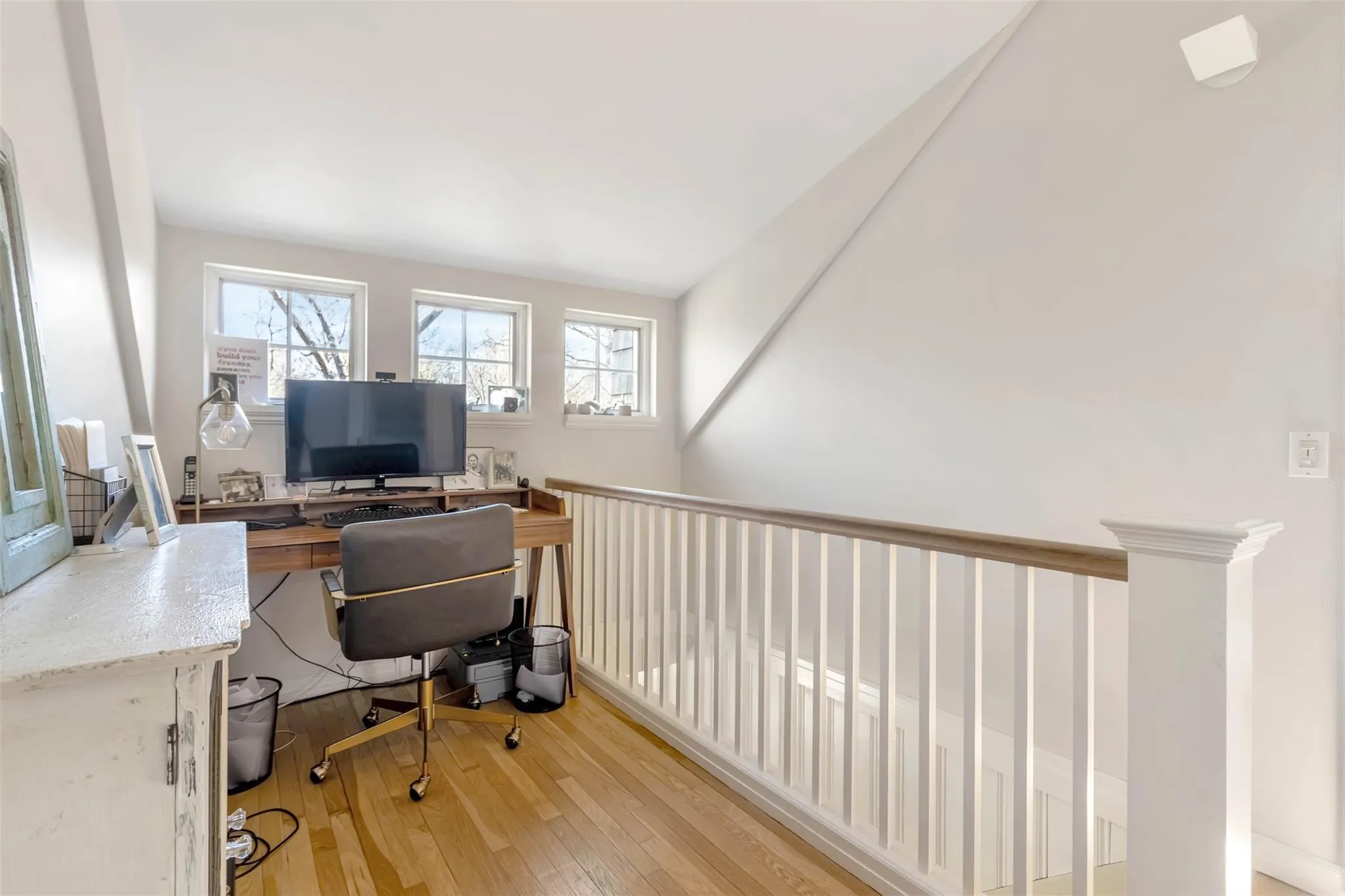 Office space with hardwood / wood-style floors Office space with hardwood / wood-style floors