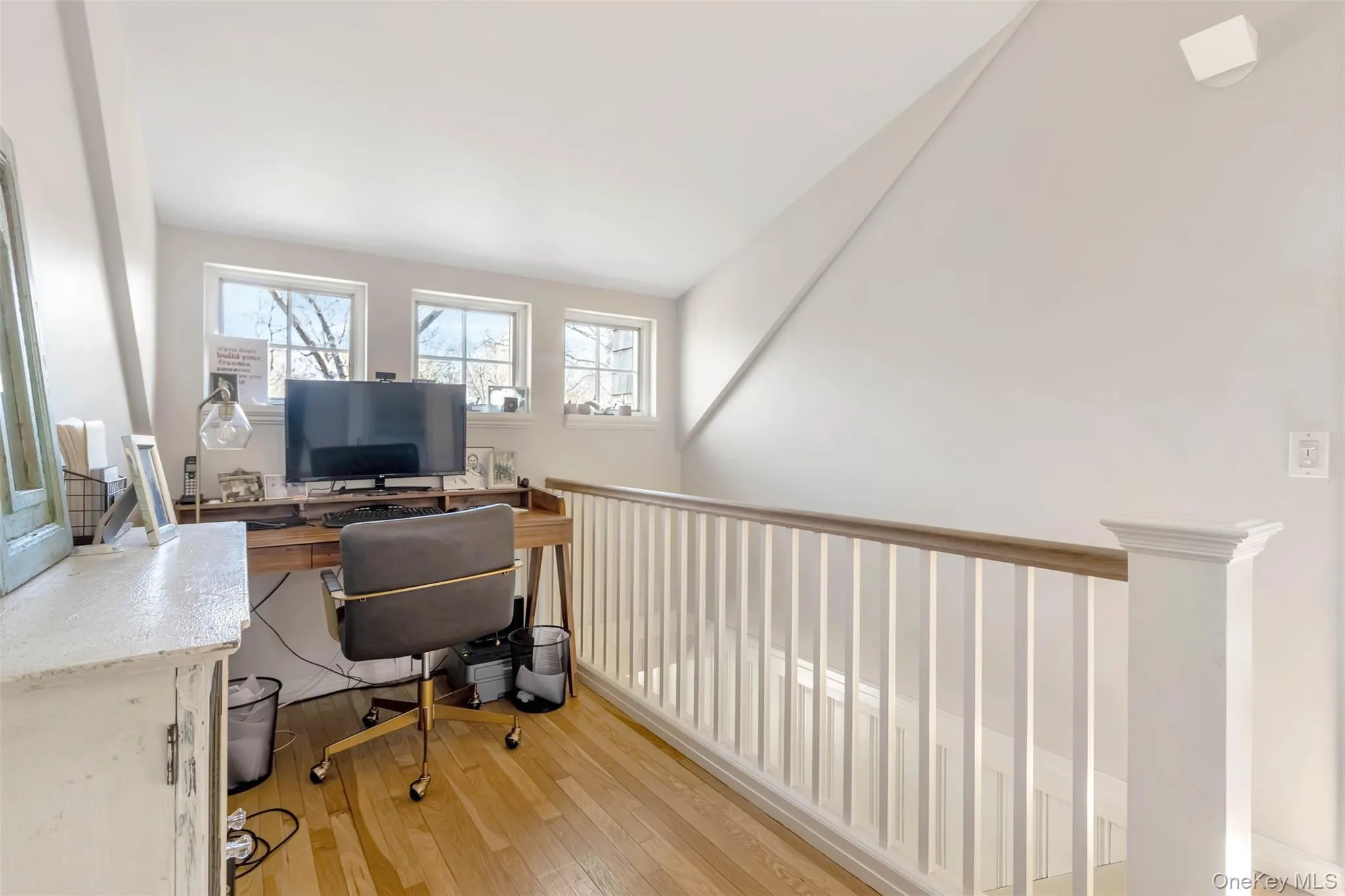 Office space with hardwood / wood-style floors Office space with hardwood / wood-style floors