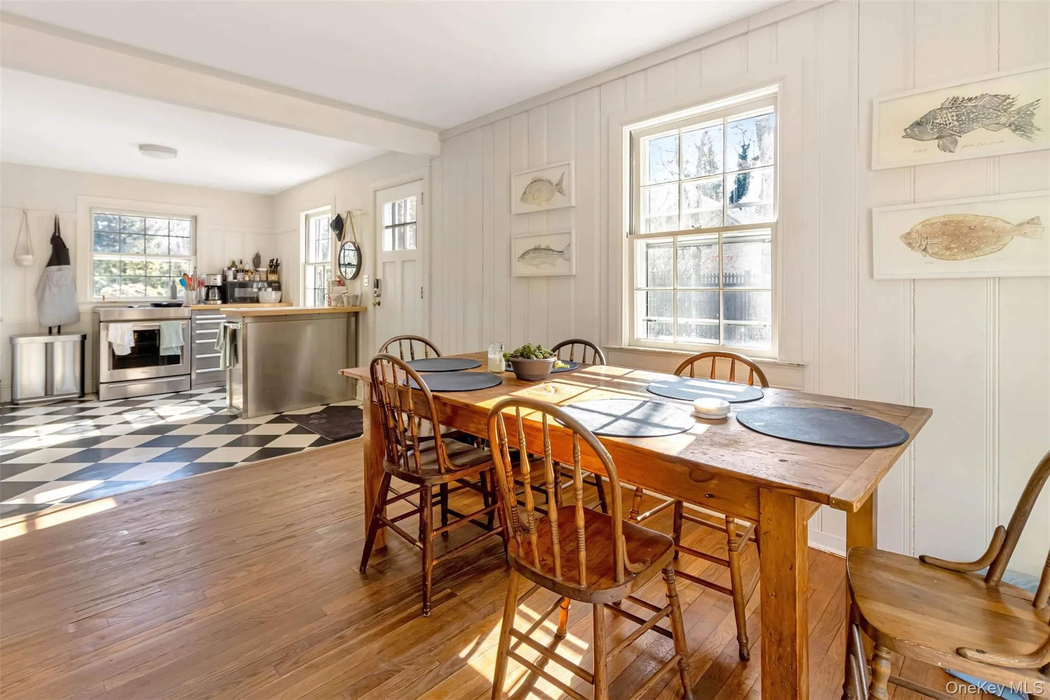 Dining room with a decorative wall Dining room with a decorative wall
