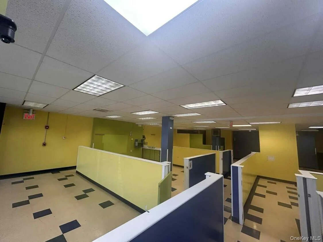 Reception area featuring a drop ceiling Reception area featuring a drop ceiling