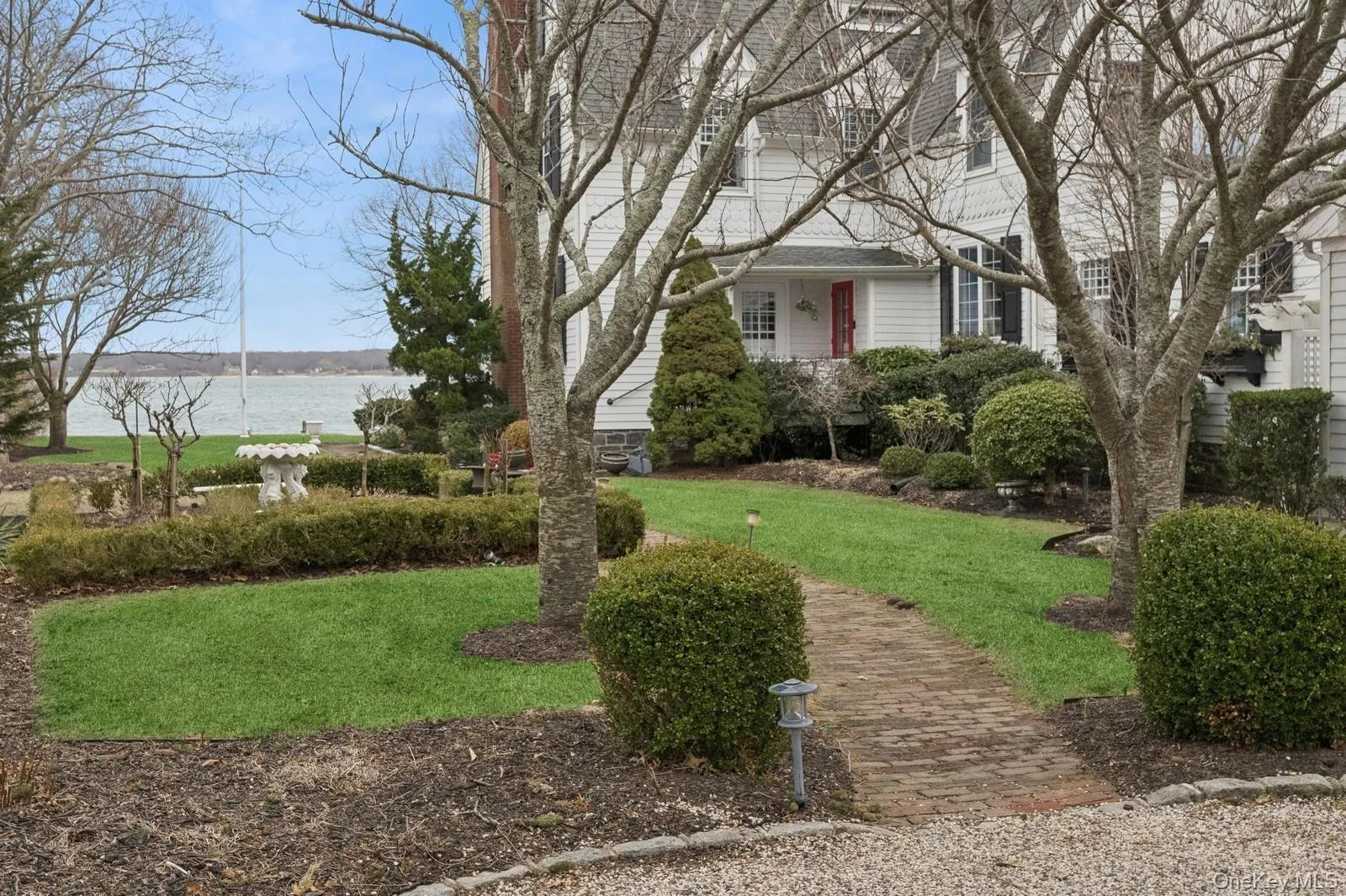 View of yard with a water view View of yard with a water view