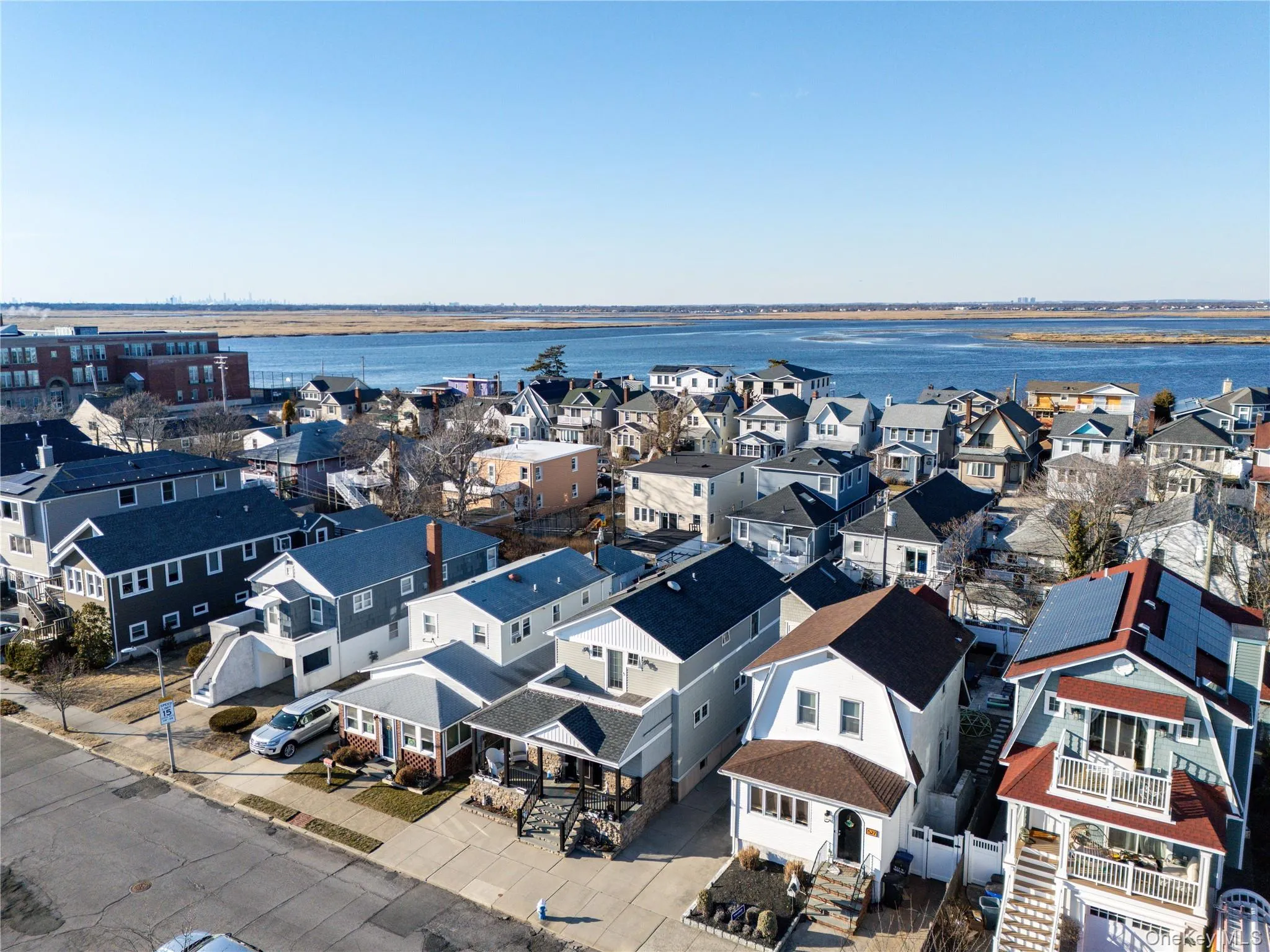 Drone / aerial view featuring a water view and a residential view Drone / aerial view featuring a water view and a residential view