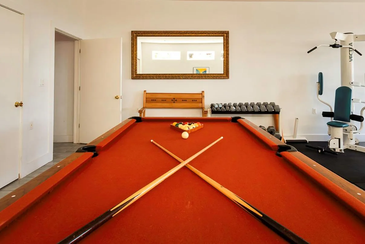 Playroom with billiards and weights Playroom with billiards and weights