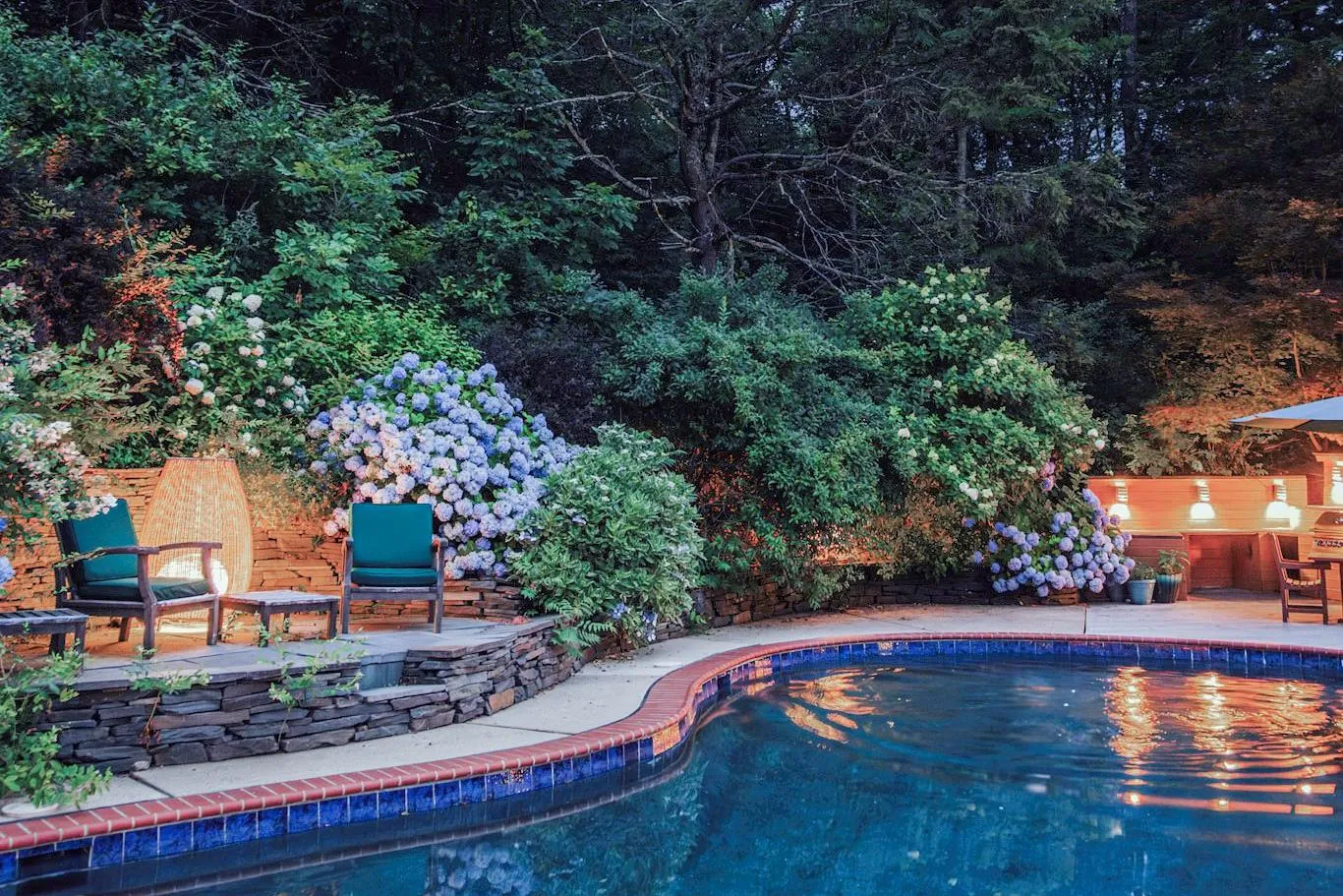 Outdoor pool with a patio Outdoor pool with a patio