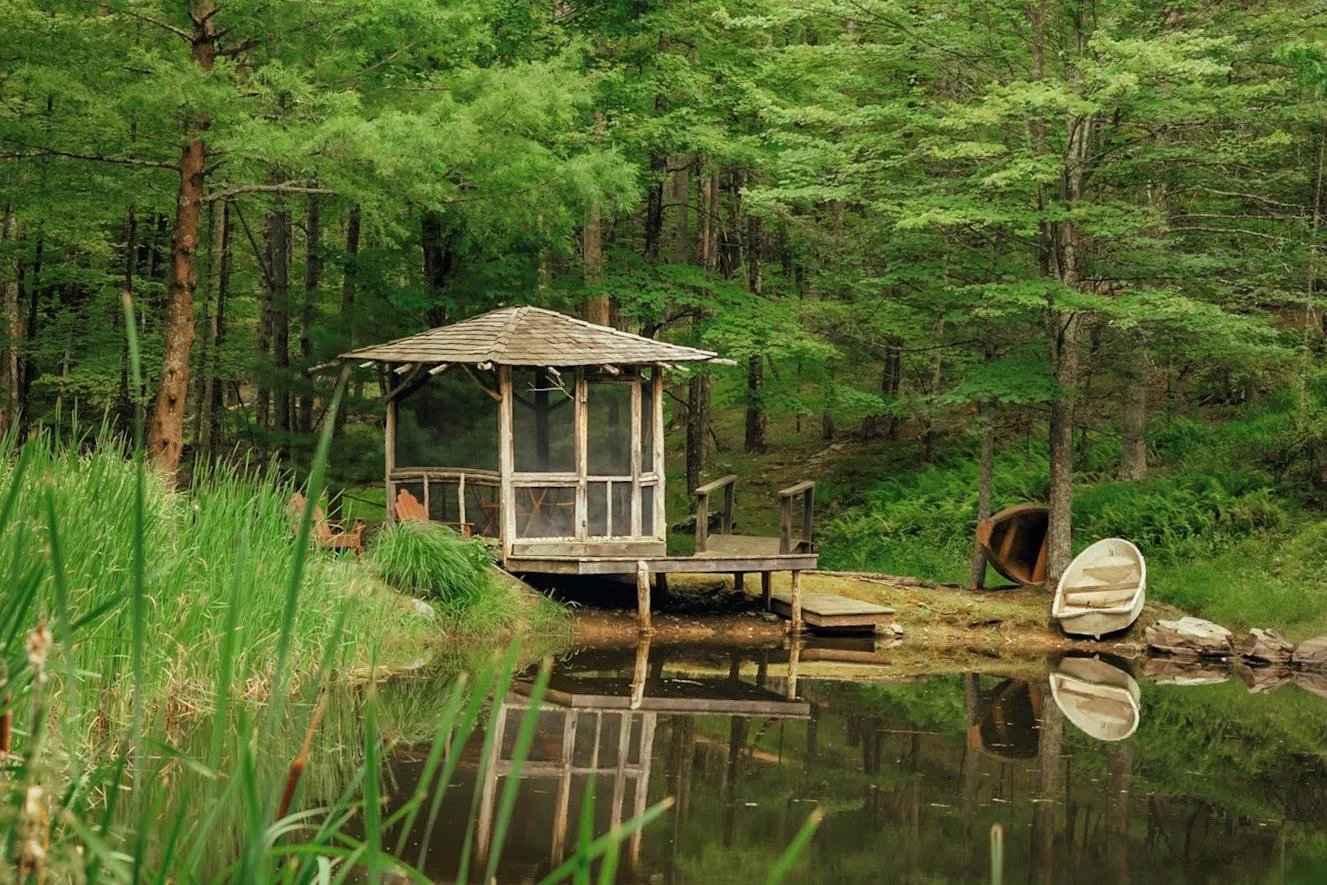 View of outbuilding featuring a wooded view View of outbuilding featuring a wooded view