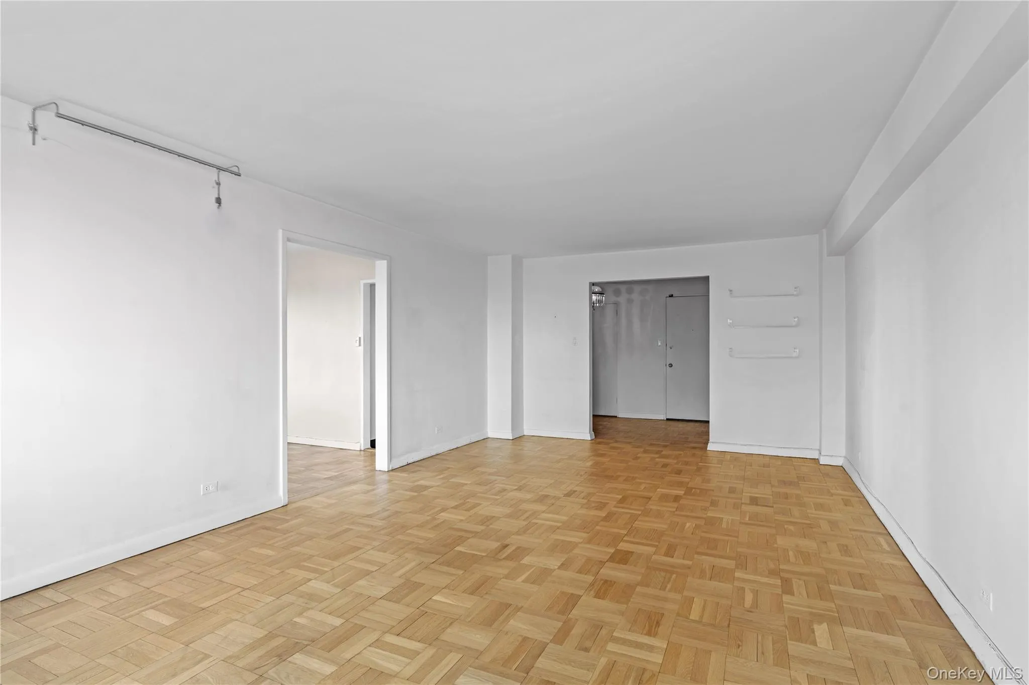 Unfurnished room with baseboards Unfurnished room with baseboards