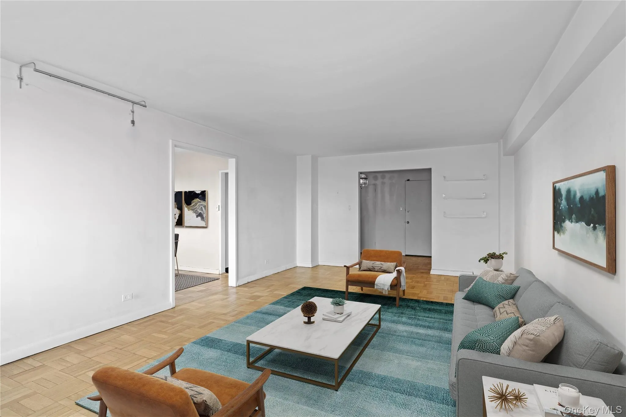 Living area featuring baseboards Living area featuring baseboards