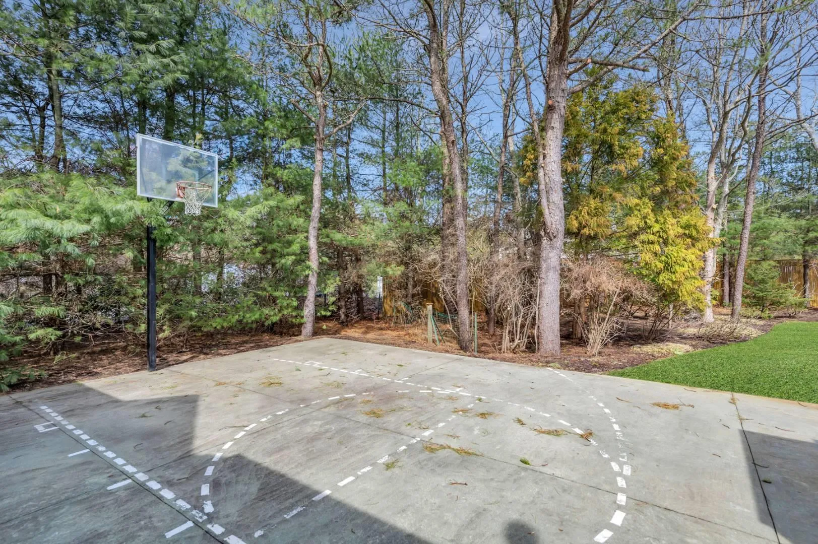 View of basketball court with basketball hoop View of basketball court with basketball hoop