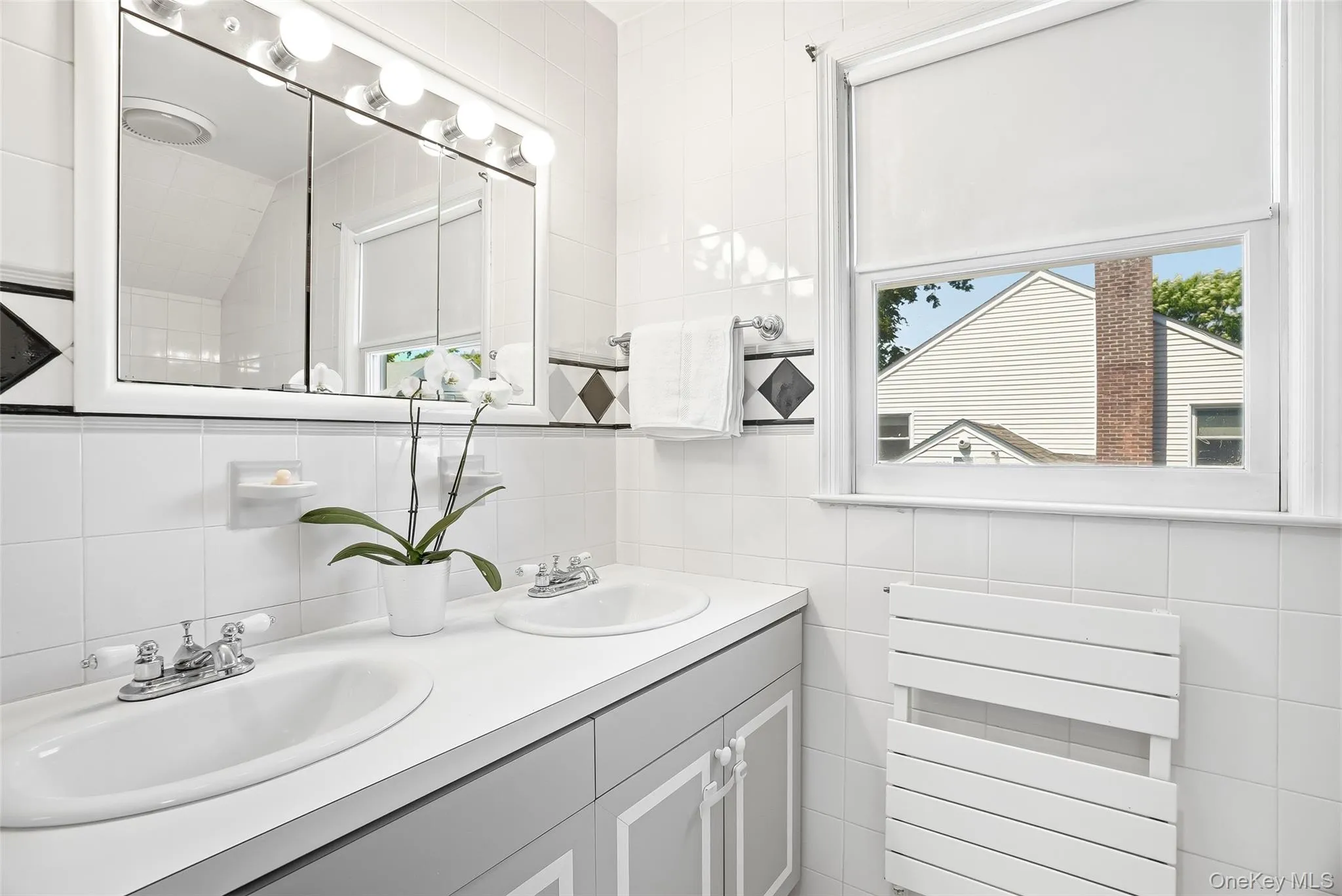 Primary bath with double sinks Primary bath with double sinks