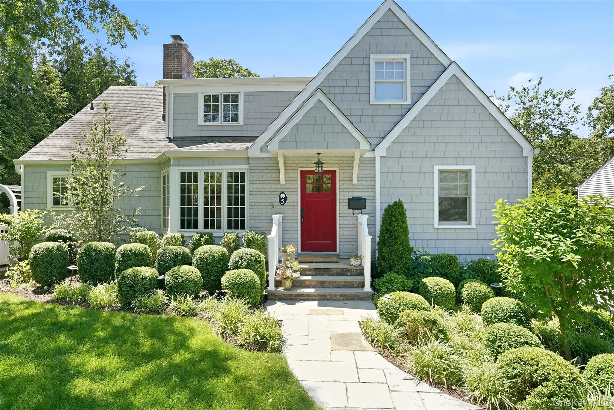 Beautifully landscaped and enhanced with new roofing and siding in 2017 Beautifully landscaped and enhanced with new roofing and siding in 2017