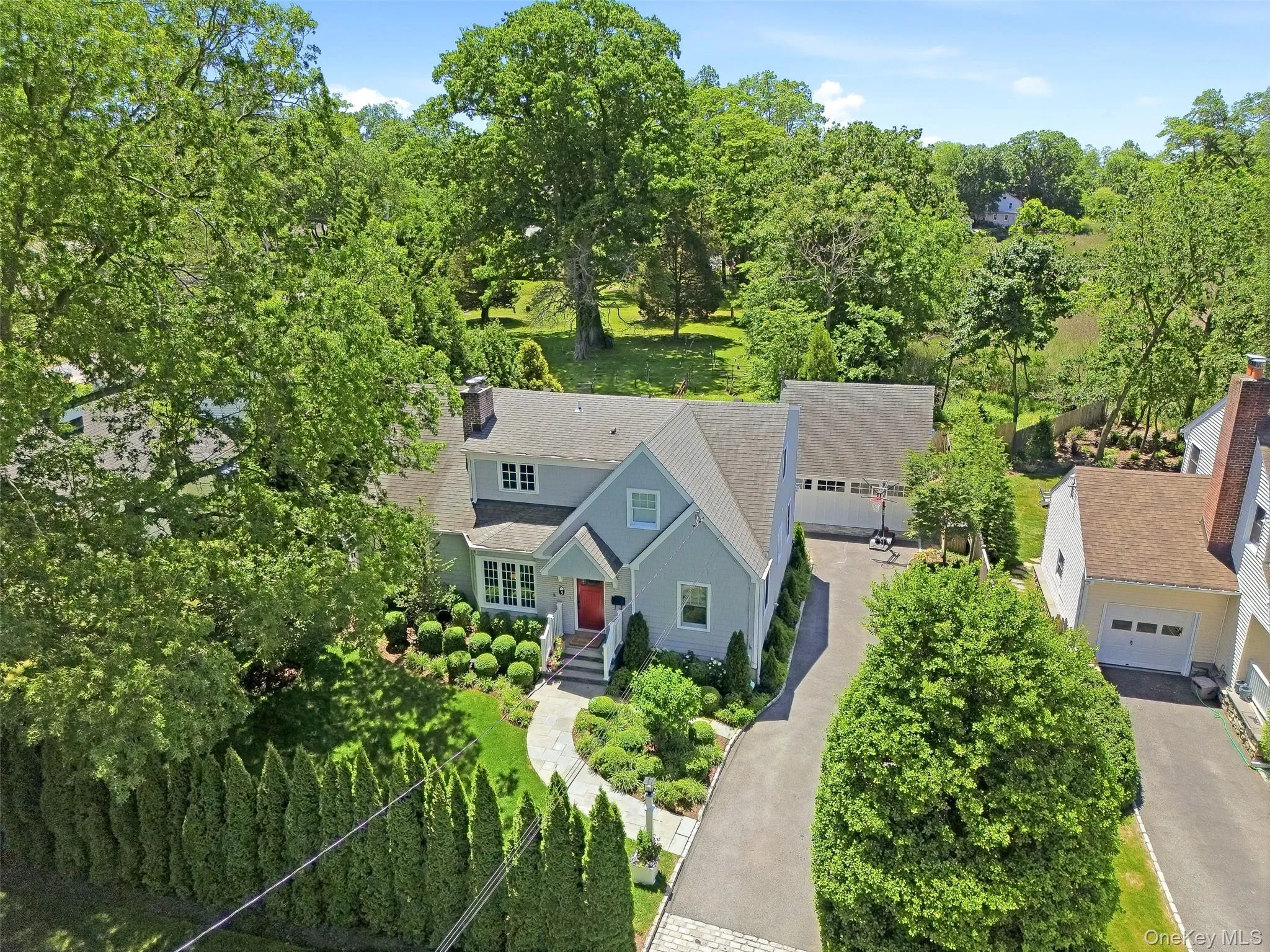 Nestled behind a row of trees for privacy off this quiet dead end street Nestled behind a row of trees for privacy off this quiet dead end street