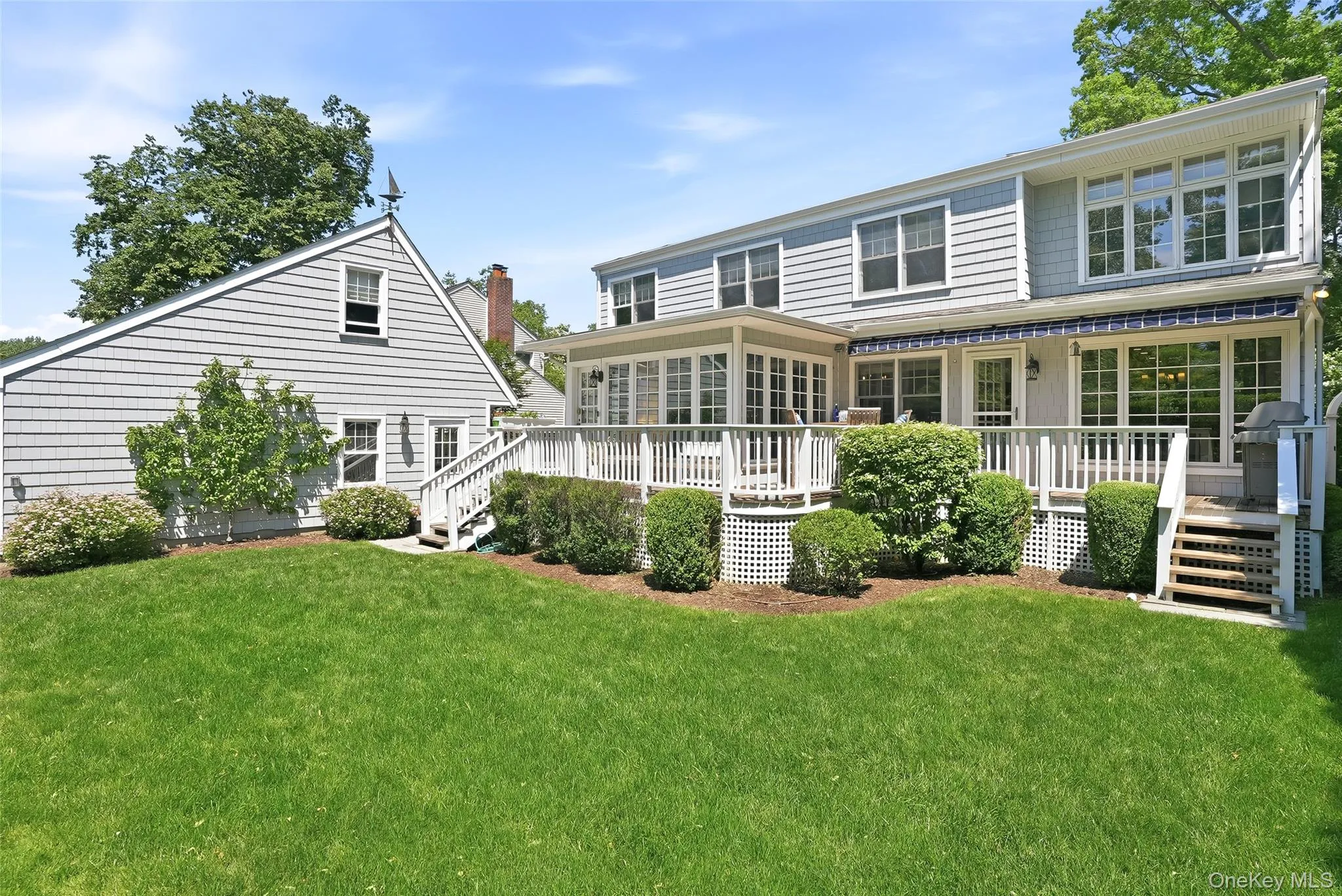 Wrap around deck with access from the kitchen as well as the sun room Wrap around deck with access from the kitchen as well as the sun room