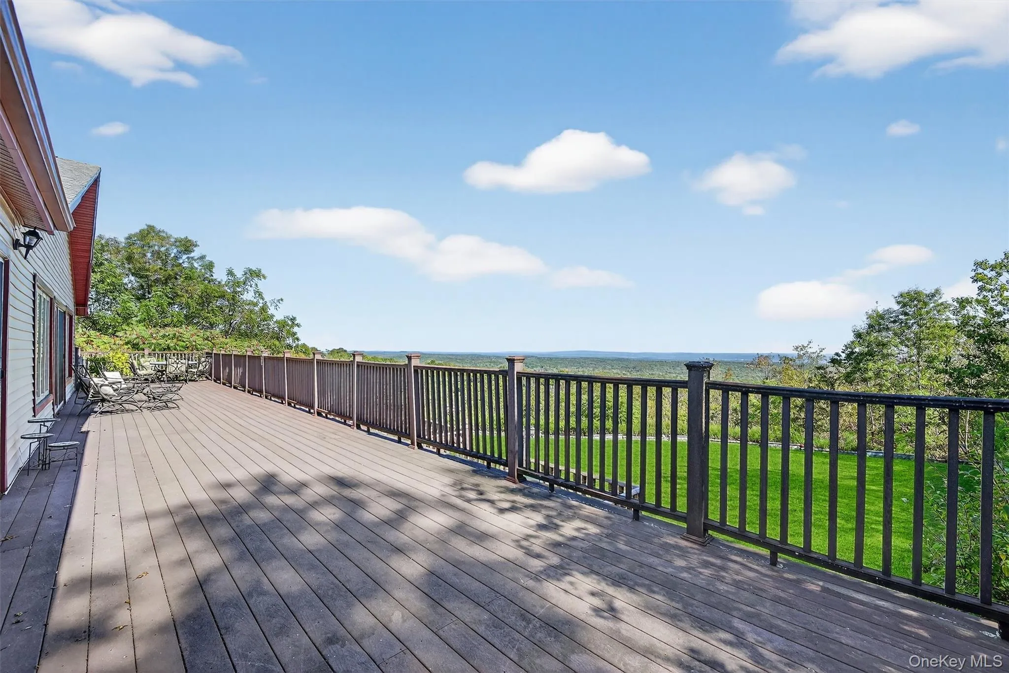Upper level wrap-around deck with spectacular views. Upper level wrap-around deck with spectacular views.