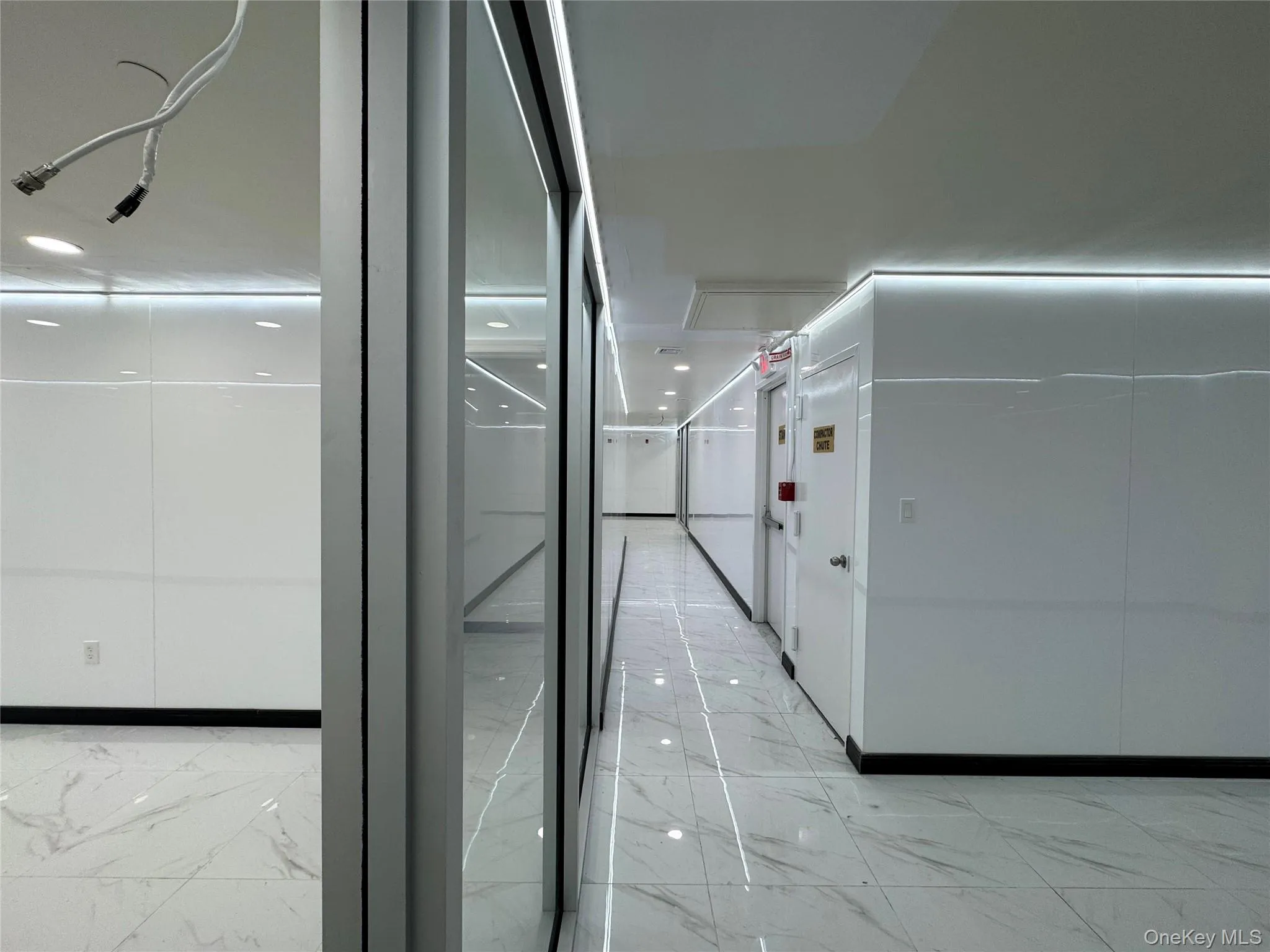 Hallway with marble finish floor Hallway with marble finish floor