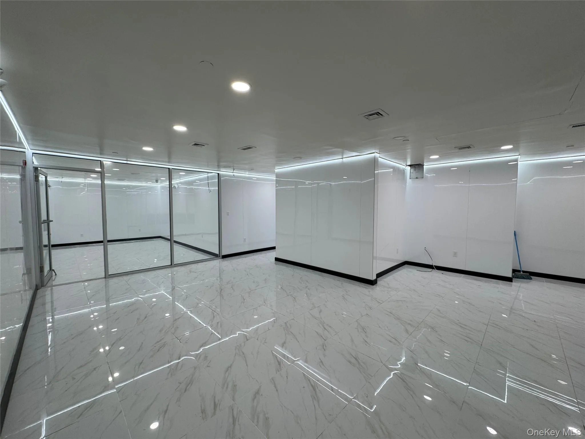 Empty room featuring visible vents and recessed lighting Empty room featuring visible vents and recessed lighting