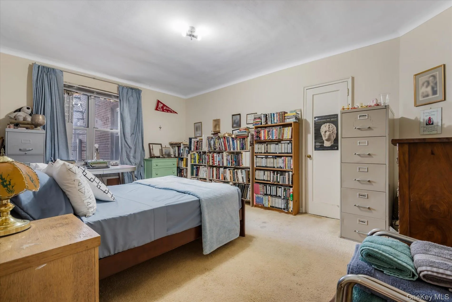 Bedroom featuring light colored carpet Bedroom featuring light colored carpet