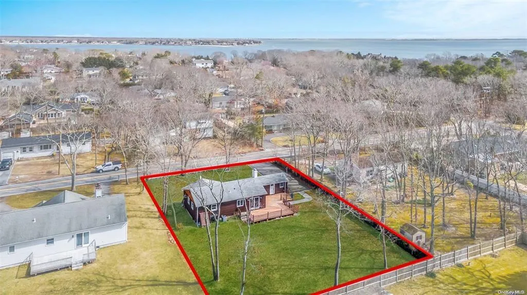 Birds eye view of property featuring a water view Birds eye view of property featuring a water view