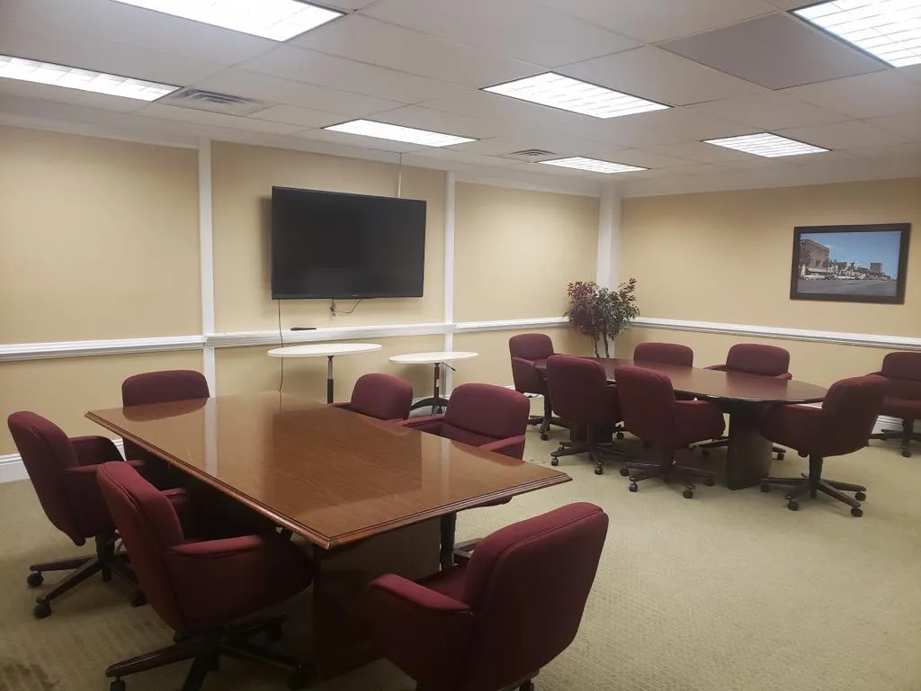 Office area with a drop ceiling, carpet, and visible vents Office area with a drop ceiling, carpet, and visible vents