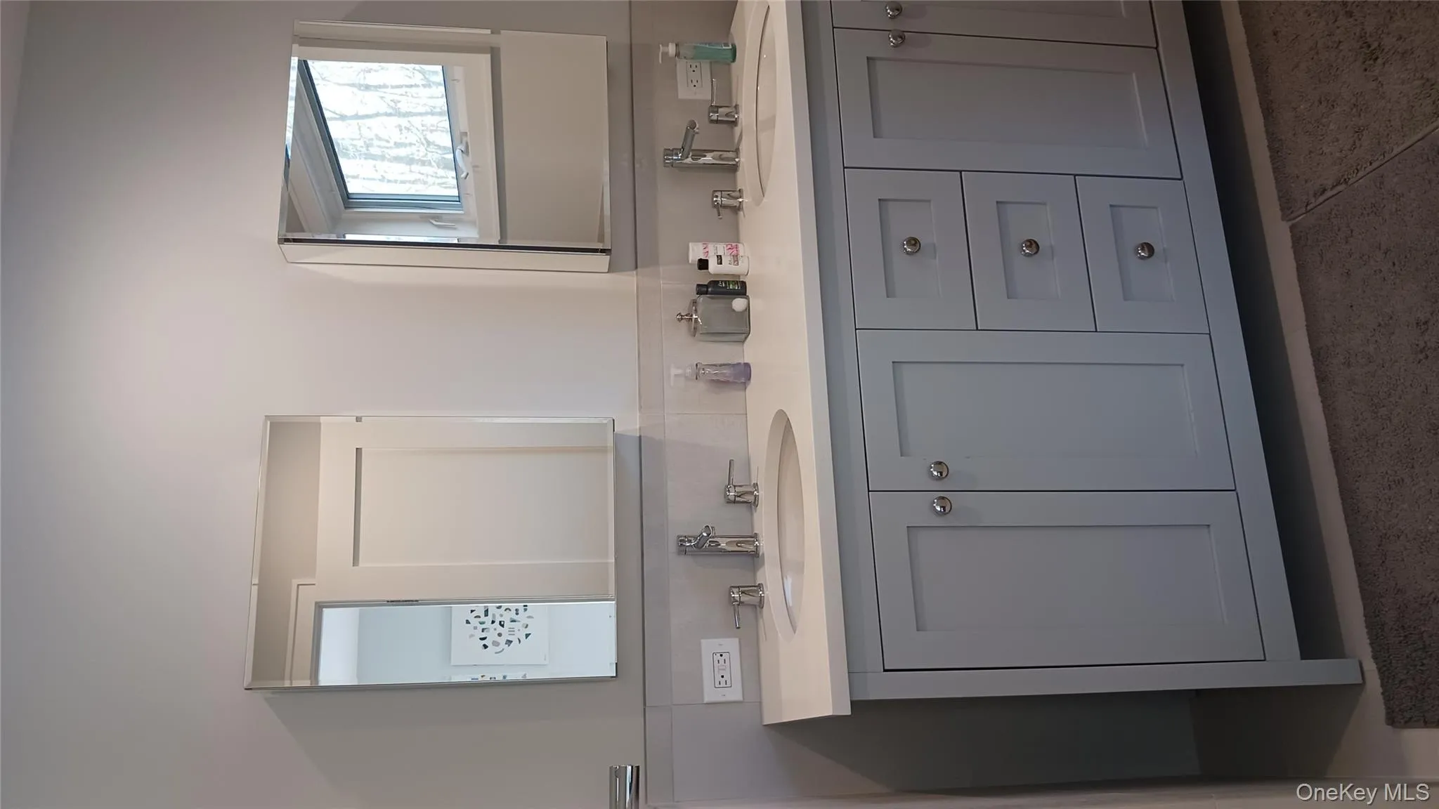 Adjoining bathroom with  double sink vanity Adjoining bathroom with  double sink vanity