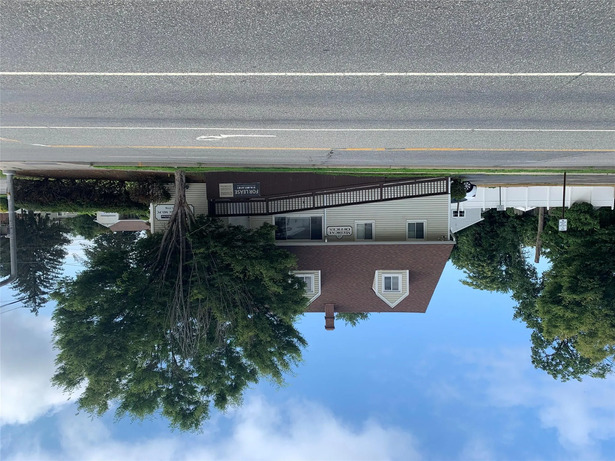 View of front of house with a chimney View of front of house with a chimney