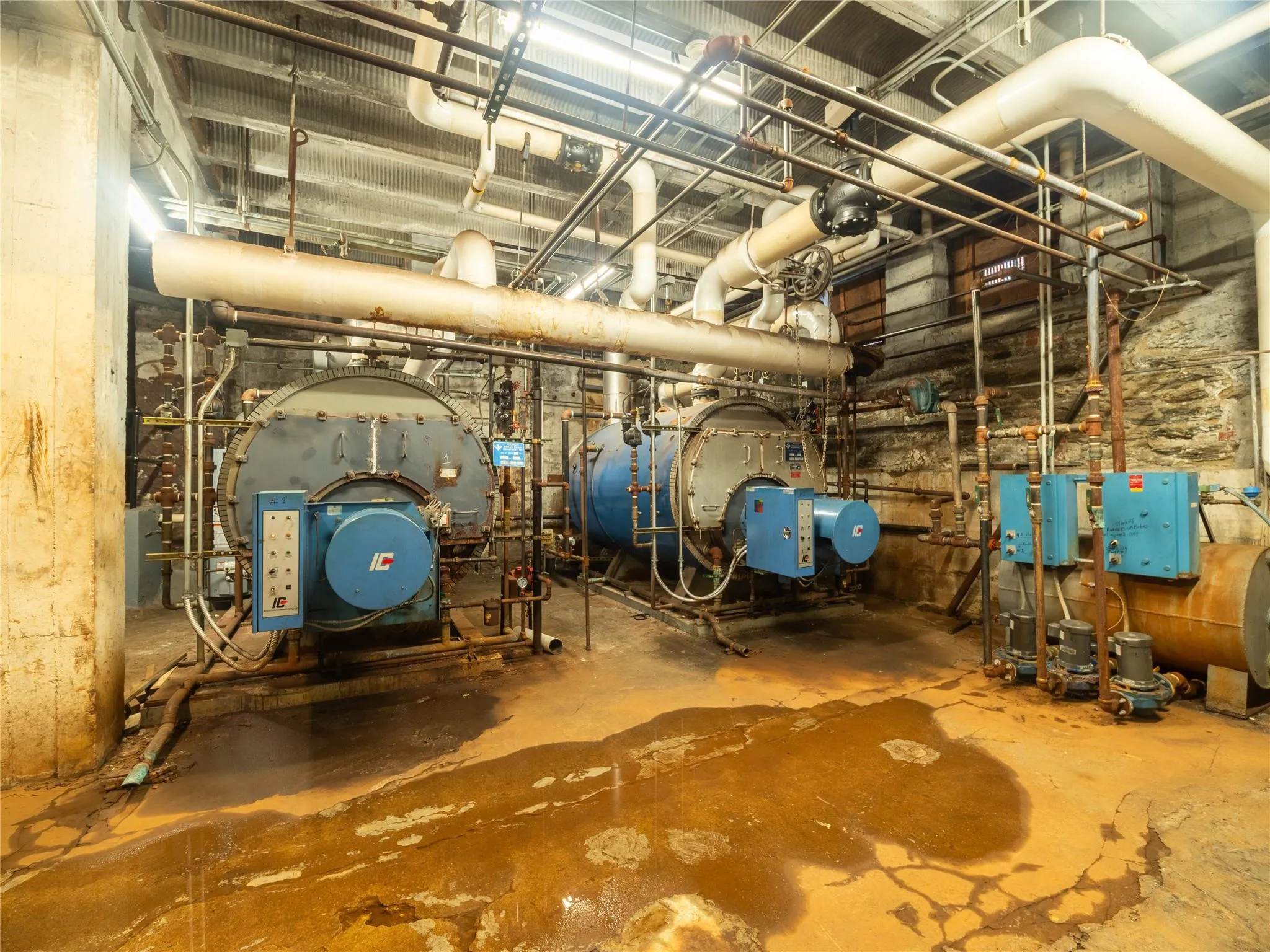 Utility room featuring heating fuel Utility room featuring heating fuel