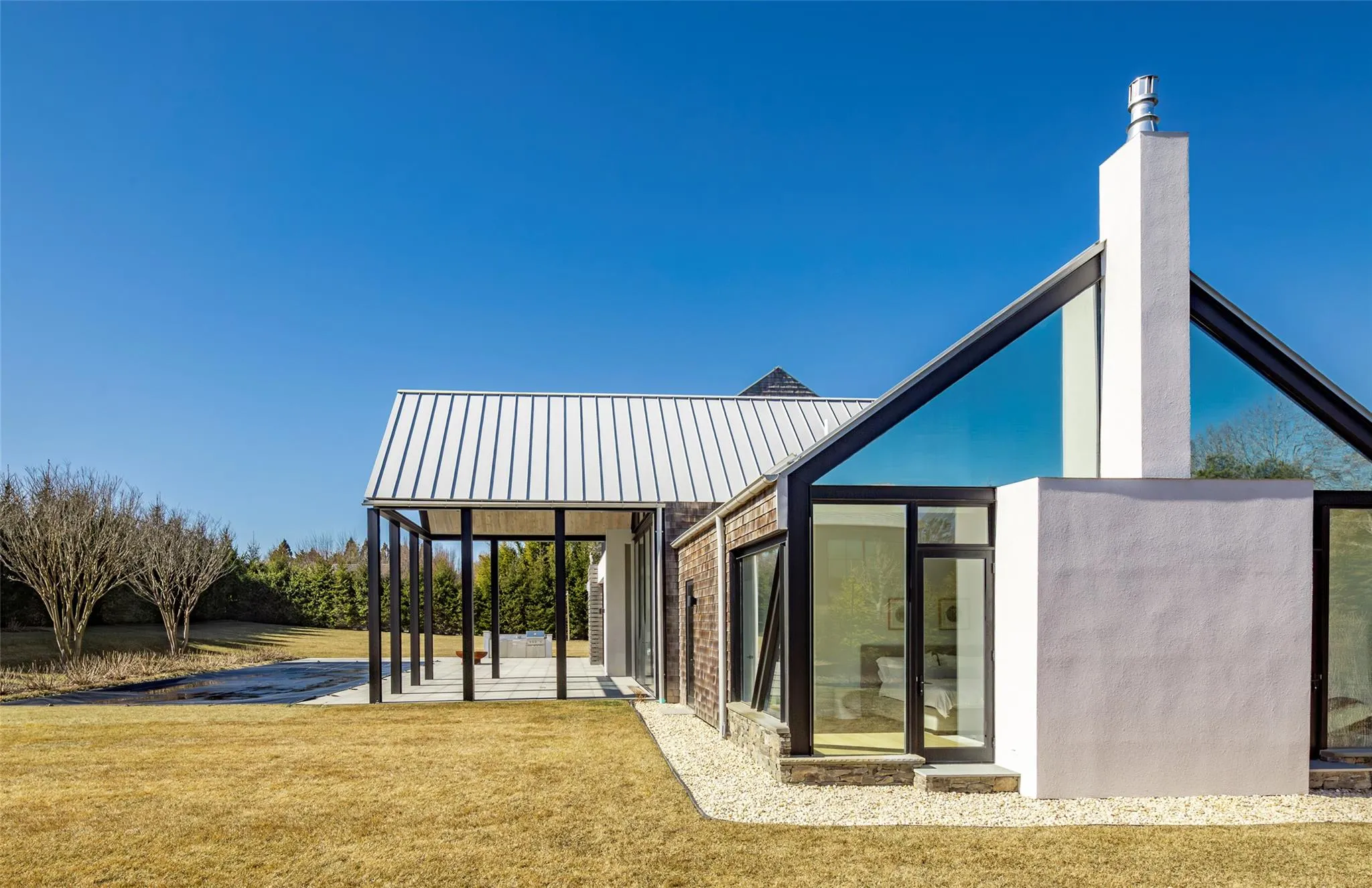 View of property's community featuring a lawn and a patio View of property's community featuring a lawn and a patio