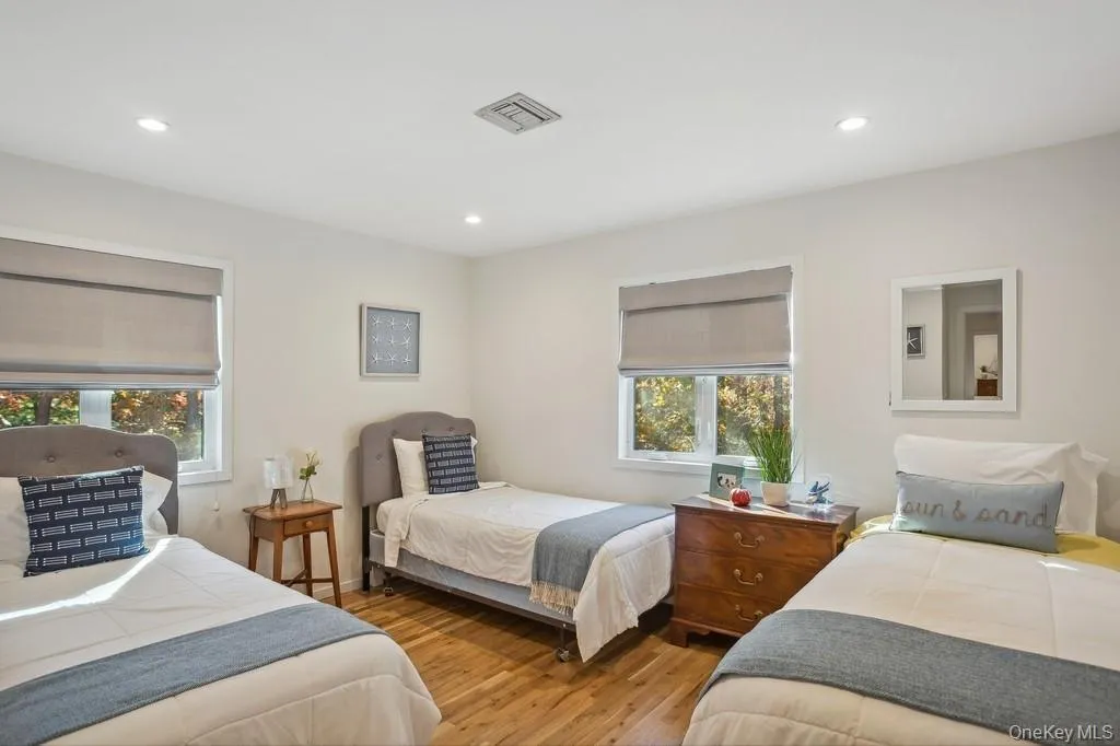 Pool View-2nd Floor Bedroom.  Large Closet, Hi Hats, Wood Flooring Pool View-2nd Floor Bedroom.  Large Closet, Hi Hats, Wood Flooring