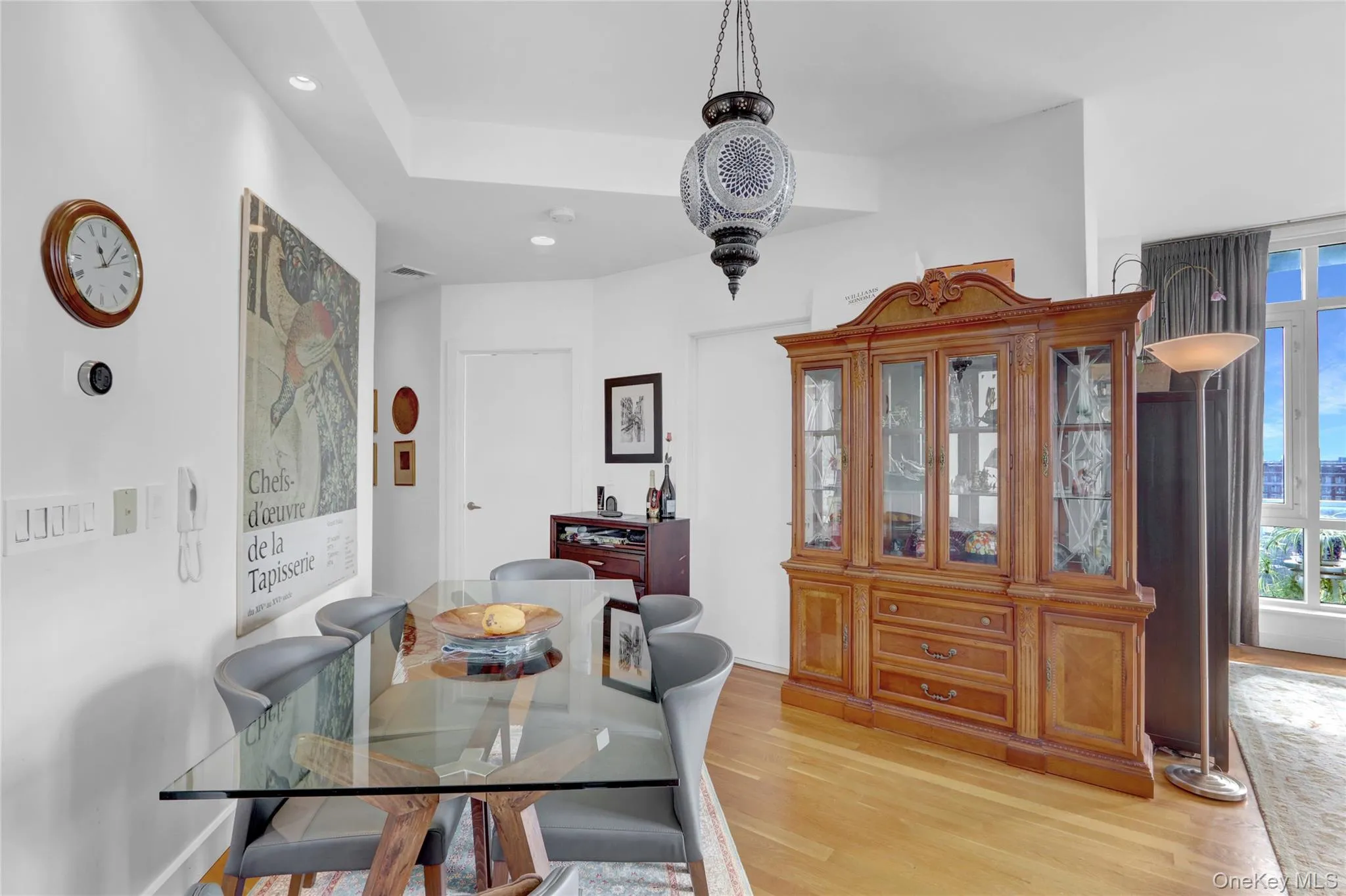 Dining space featuring recessed lighting, a healthy amount of sunlight, light wood-type flooring, and visible vents Dining space featuring recessed lighting, a healthy amount of sunlight, light wood-type flooring, and visible vents