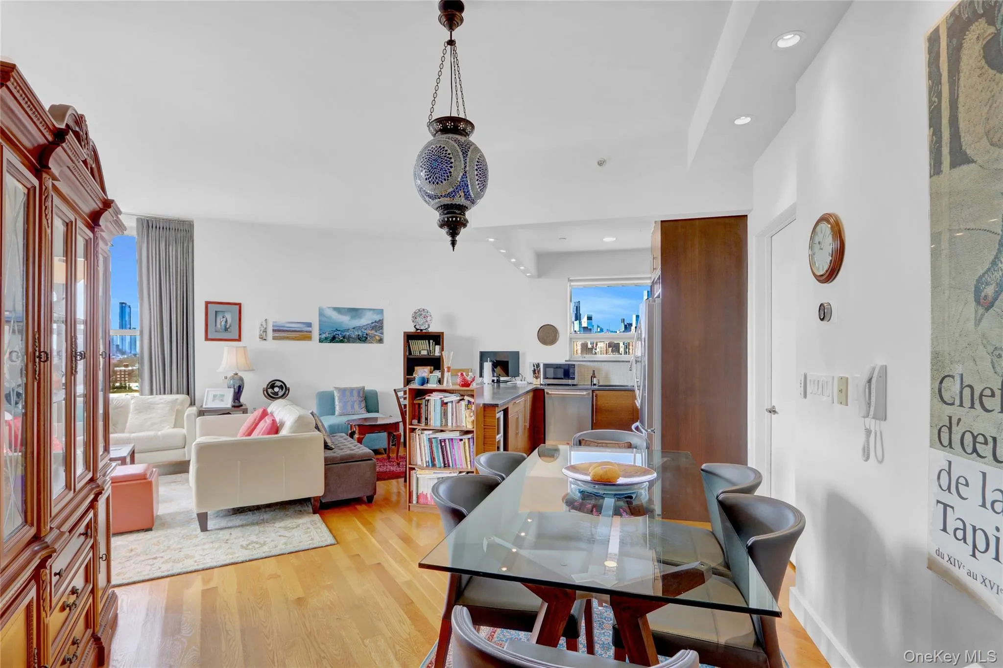 Dining area with recessed lighting, light wood-style floors, and baseboards Dining area with recessed lighting, light wood-style floors, and baseboards