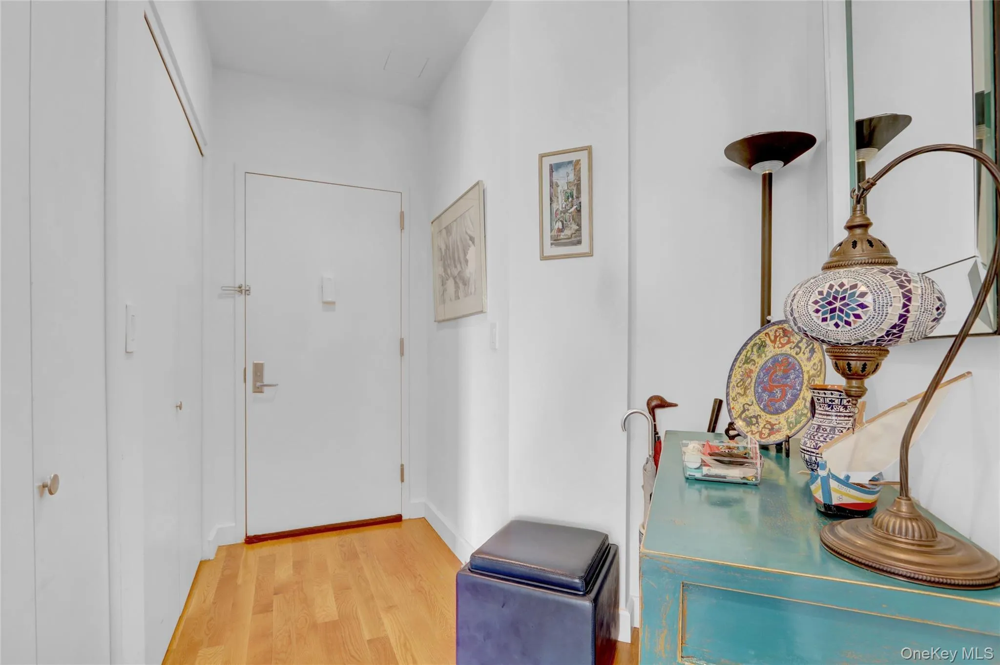 Doorway featuring light wood-style flooring Doorway featuring light wood-style flooring