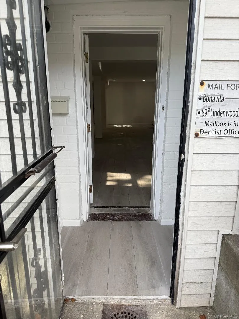 View of exterior entry with brick siding View of exterior entry with brick siding