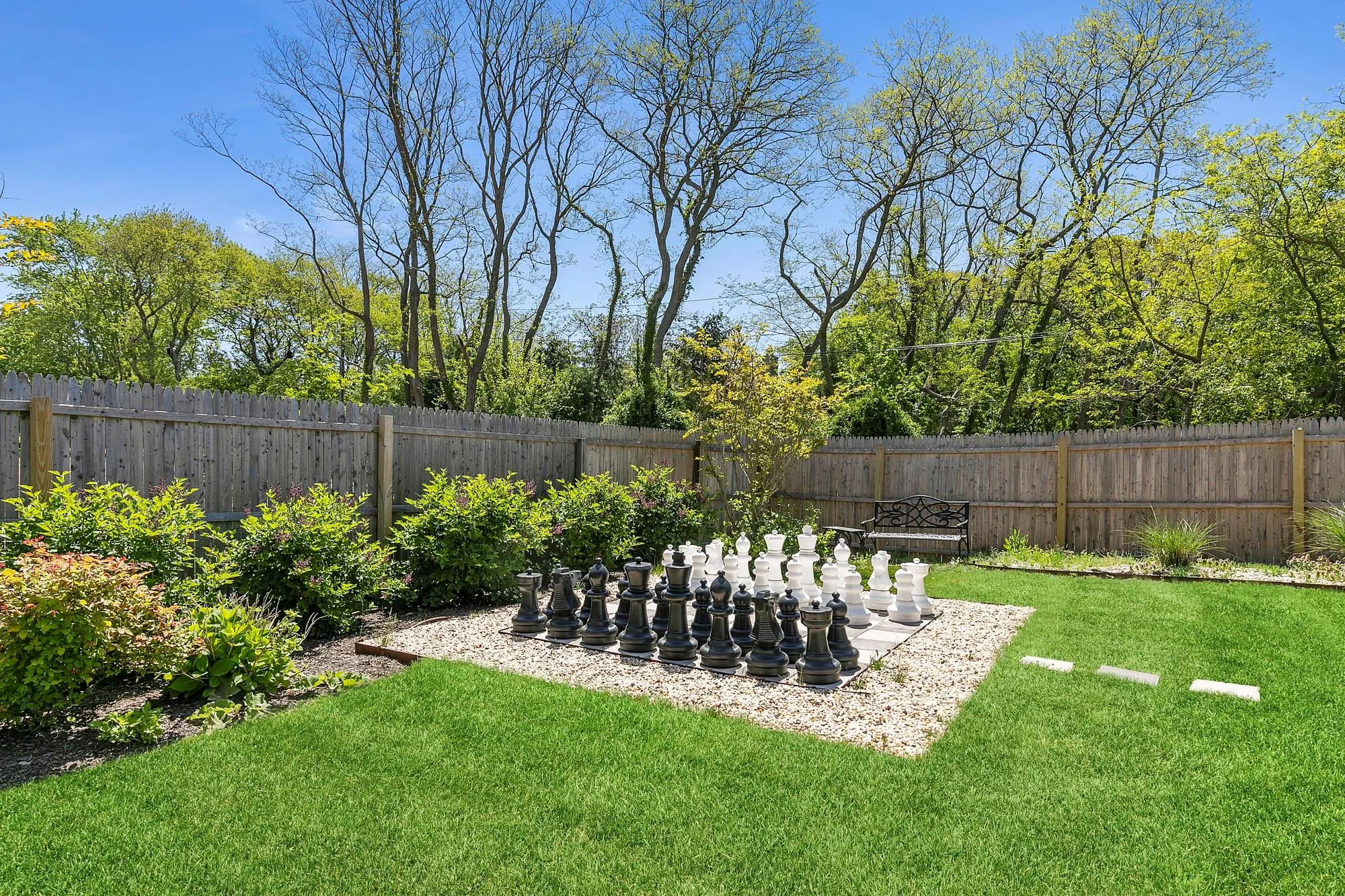 View of yard featuring a patio and a fenced backyard View of yard featuring a patio and a fenced backyard