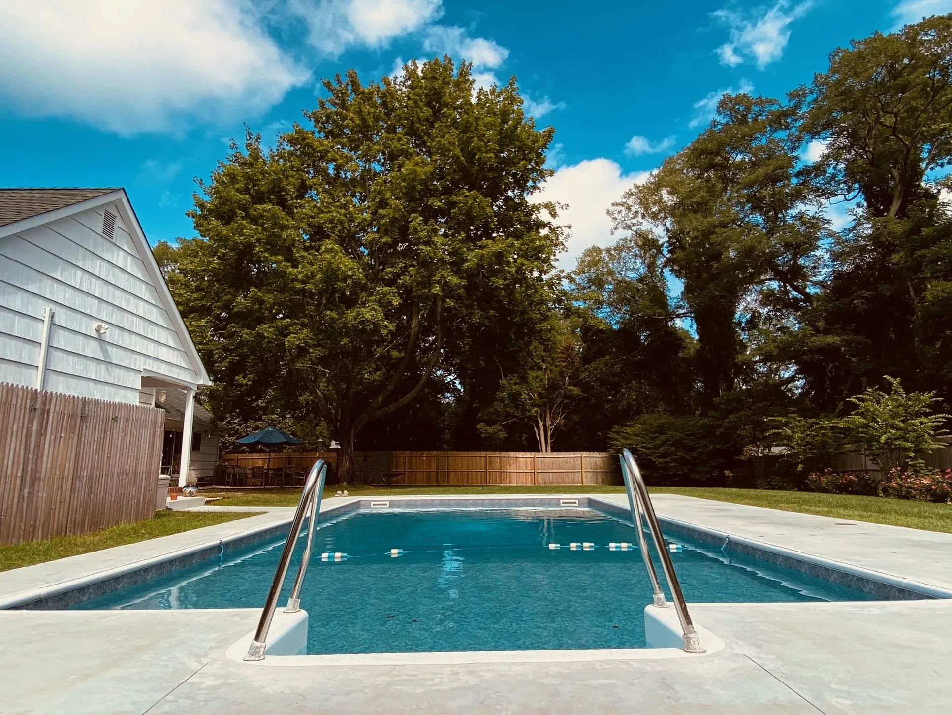 View of swimming pool with a patio area, a fenced backyard, and a fenced in pool View of swimming pool with a patio area, a fenced backyard, and a fenced in pool