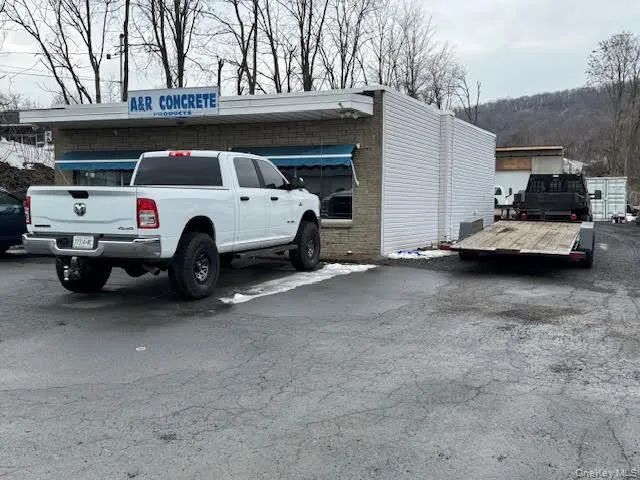 View of car parking in front of the office building. View of car parking in front of the office building.
