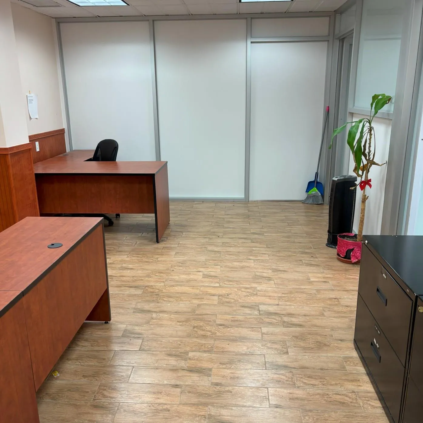 Home office featuring light wood finished floors Home office featuring light wood finished floors