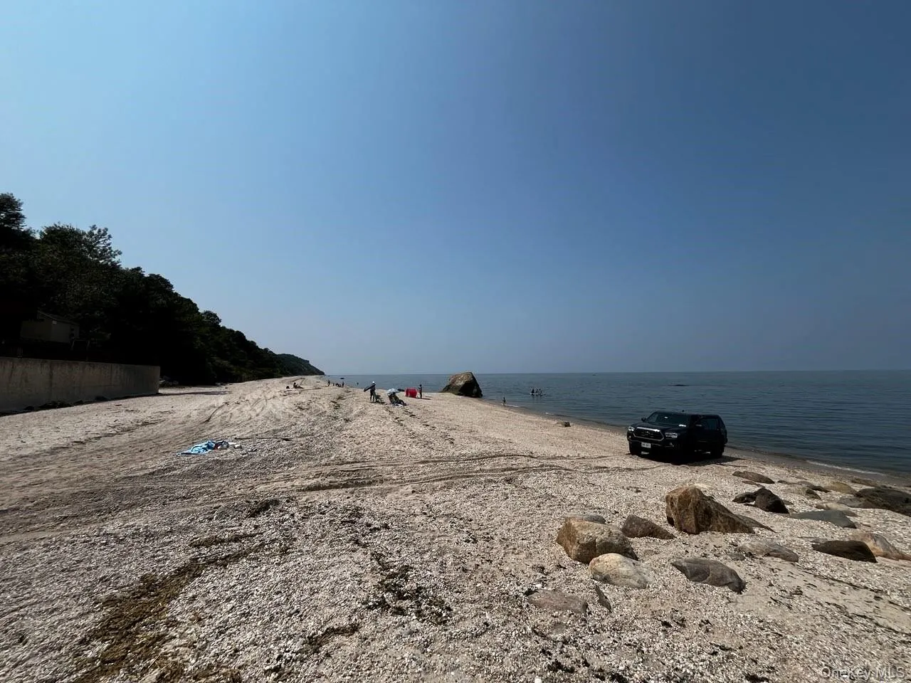Water view featuring local beach Water view featuring local beach