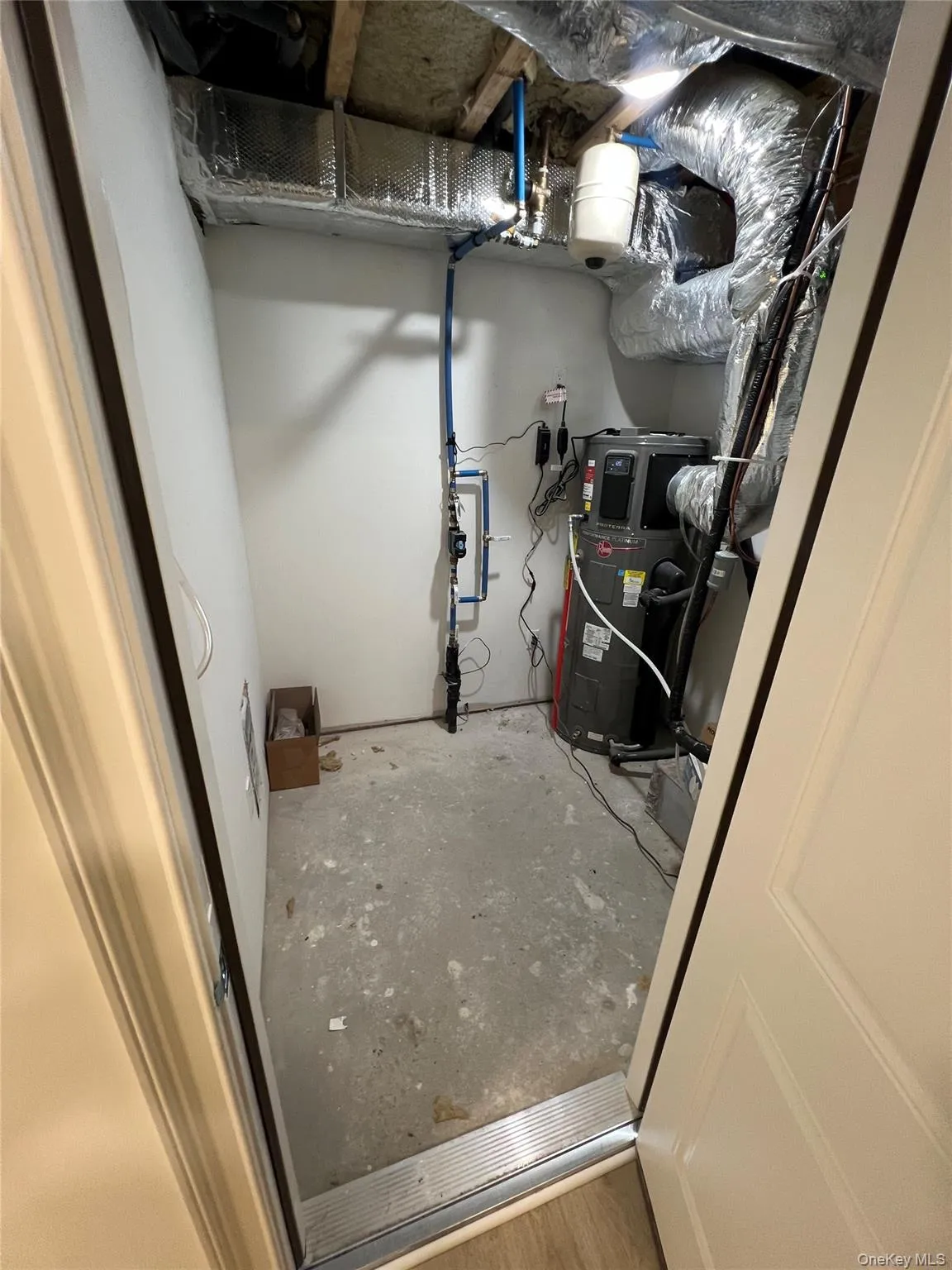 Utilities featuring water heater Utilities featuring water heater