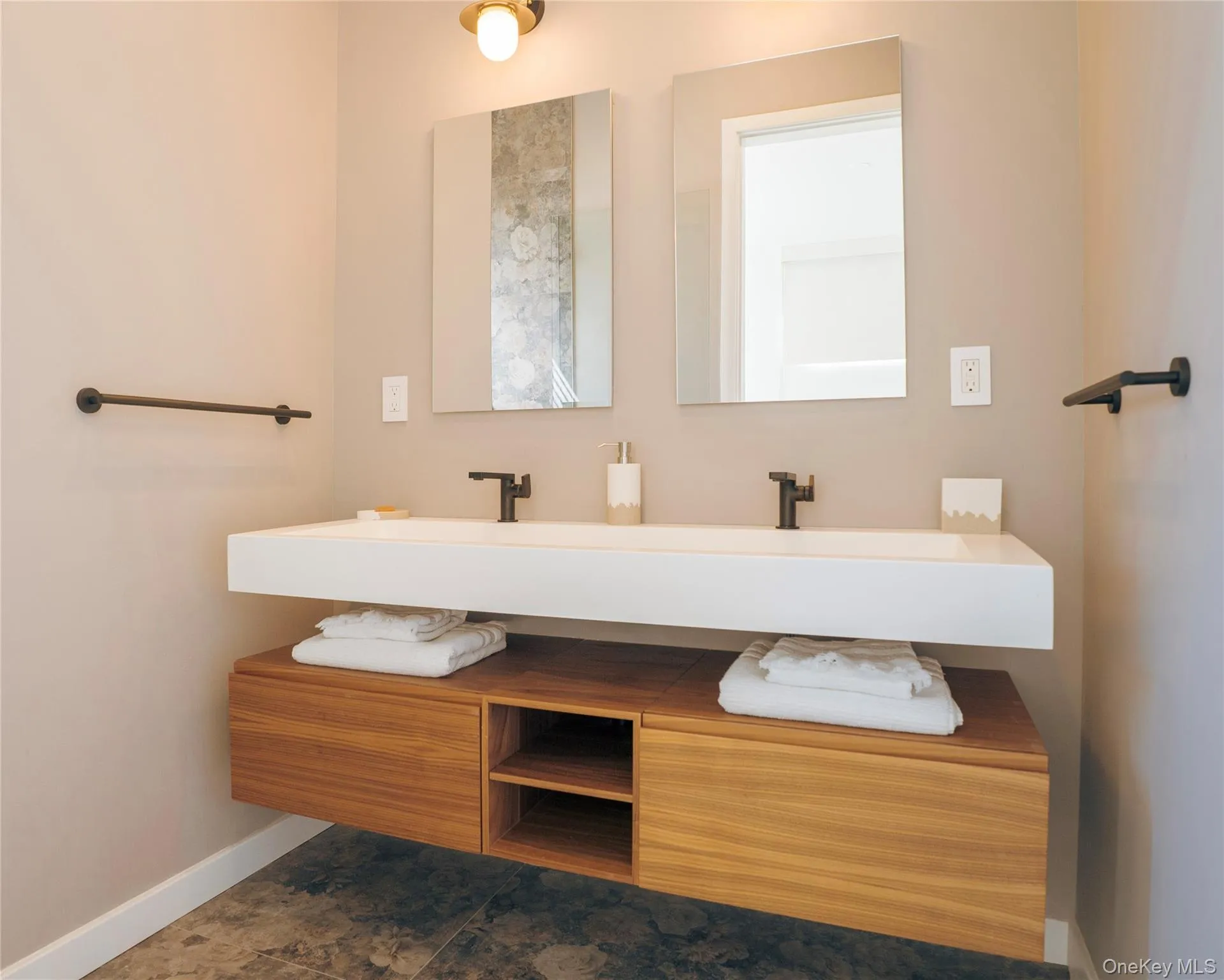 Bathroom with baseboards and vanity Bathroom with baseboards and vanity
