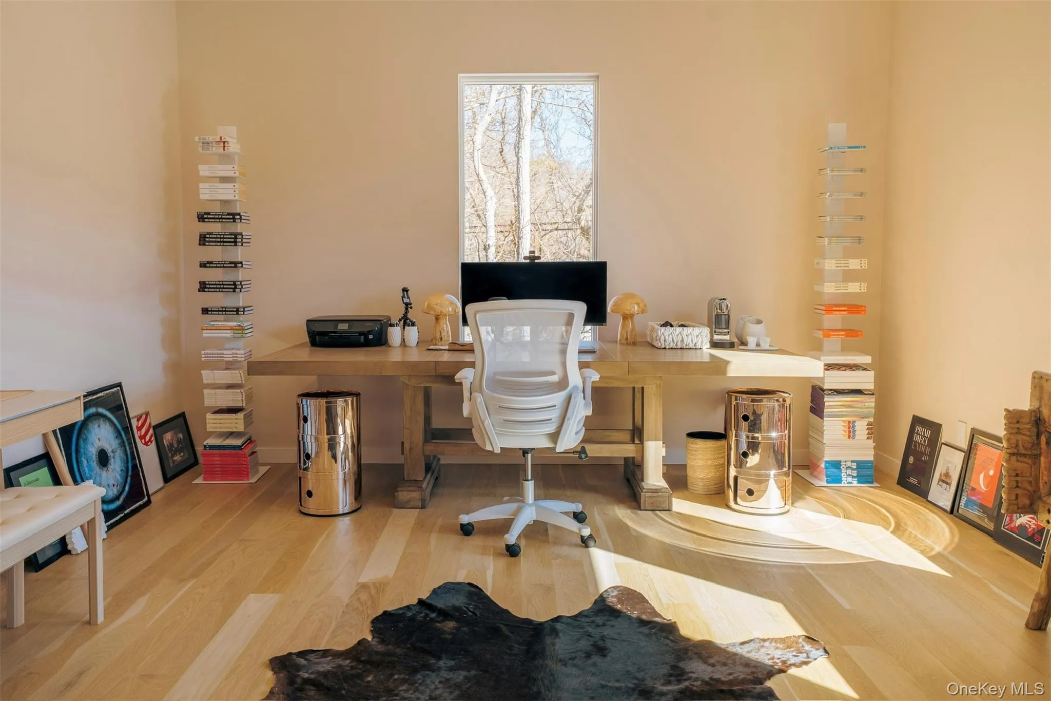 Office featuring wood finished floors and baseboards Office featuring wood finished floors and baseboards