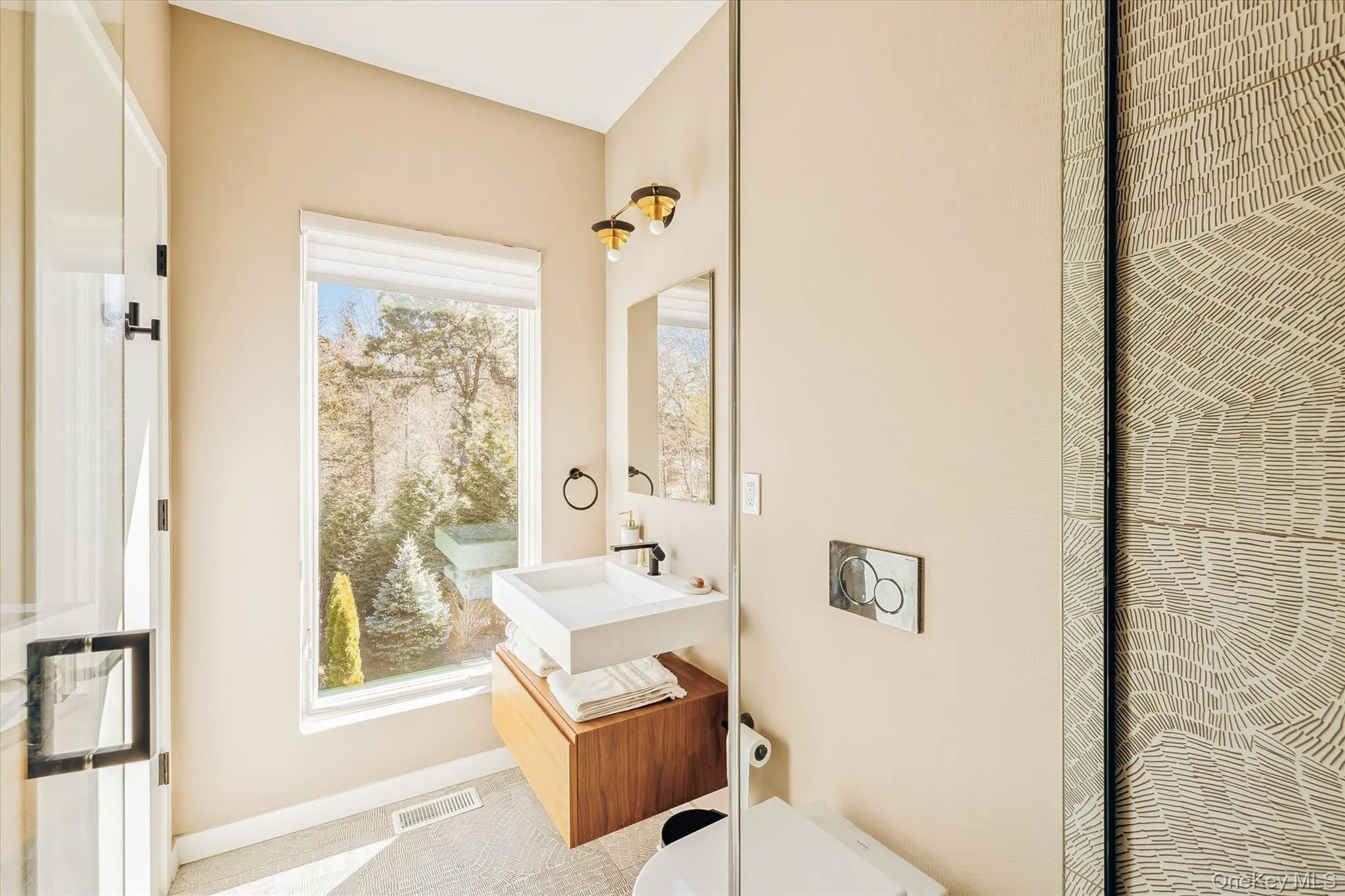 Bathroom featuring visible vents, toilet, and vanity Bathroom featuring visible vents, toilet, and vanity