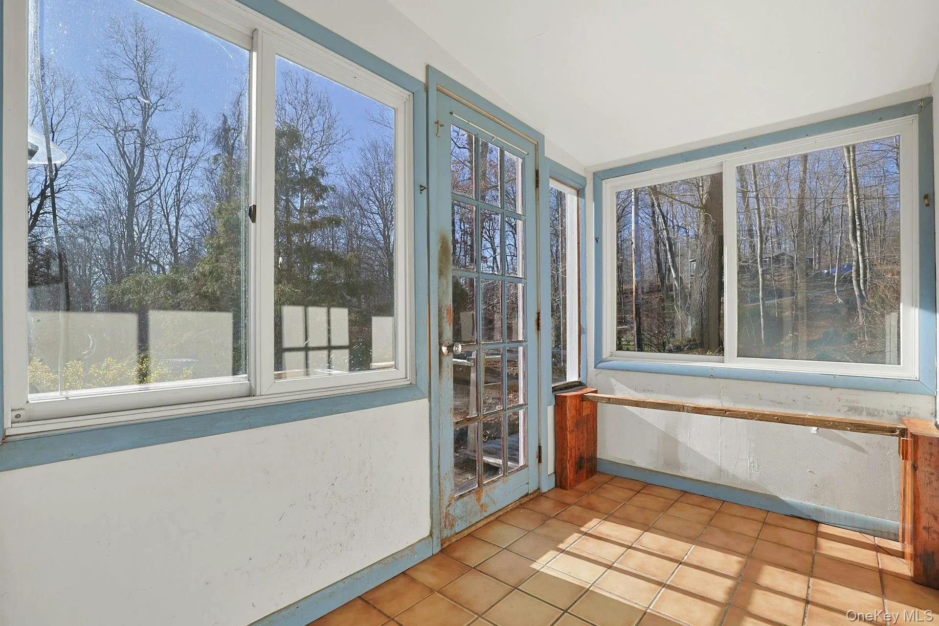 Step into the tiled entryway - with large windows that look out to the nearly 2 acres of property. Step into the tiled entryway - with large windows that look out to the nearly 2 acres of property.