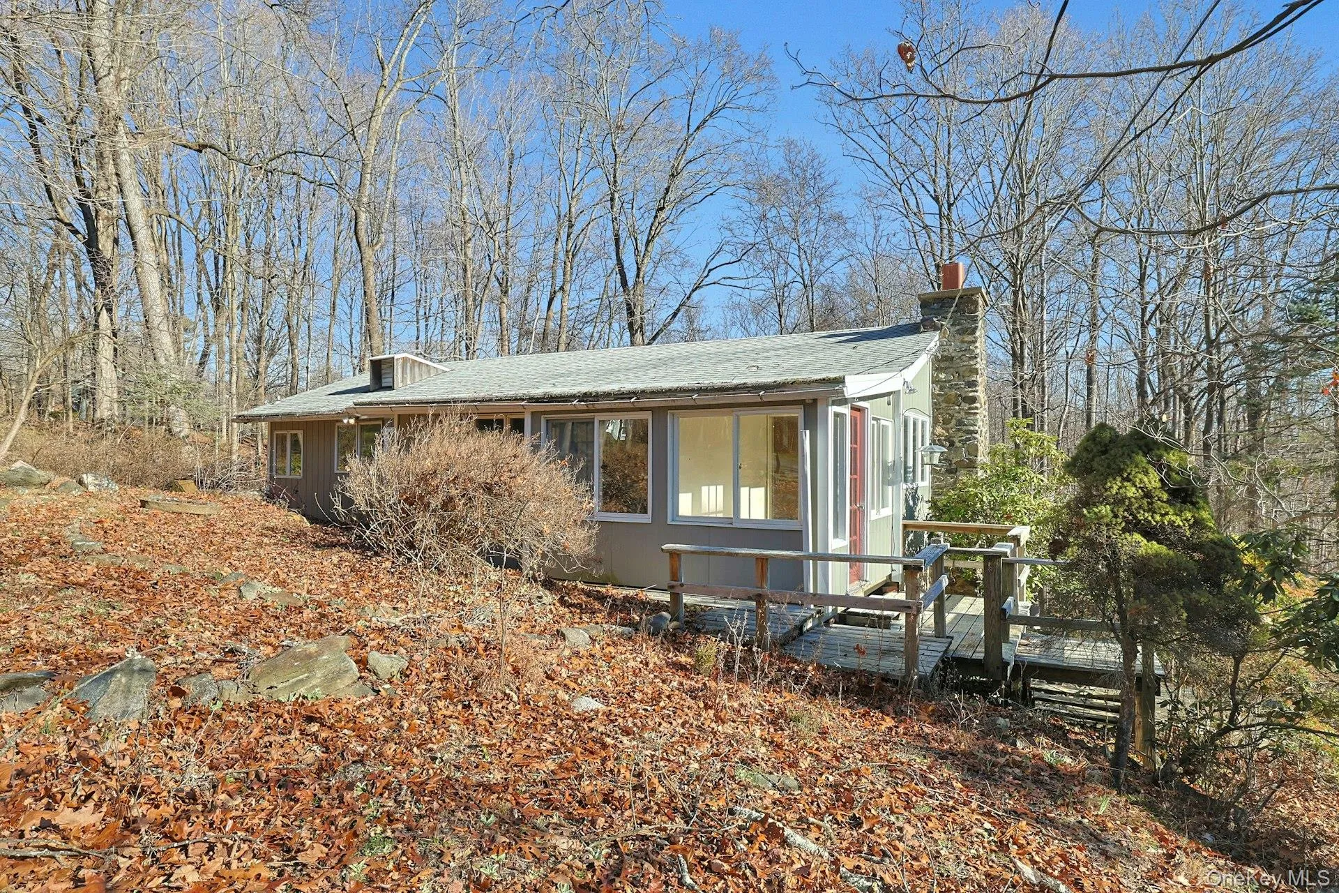 Off of the front entrance, the small deck is another great spot to sit and watch the wildlife. Off of the front entrance, the small deck is another great spot to sit and watch the wildlife.
