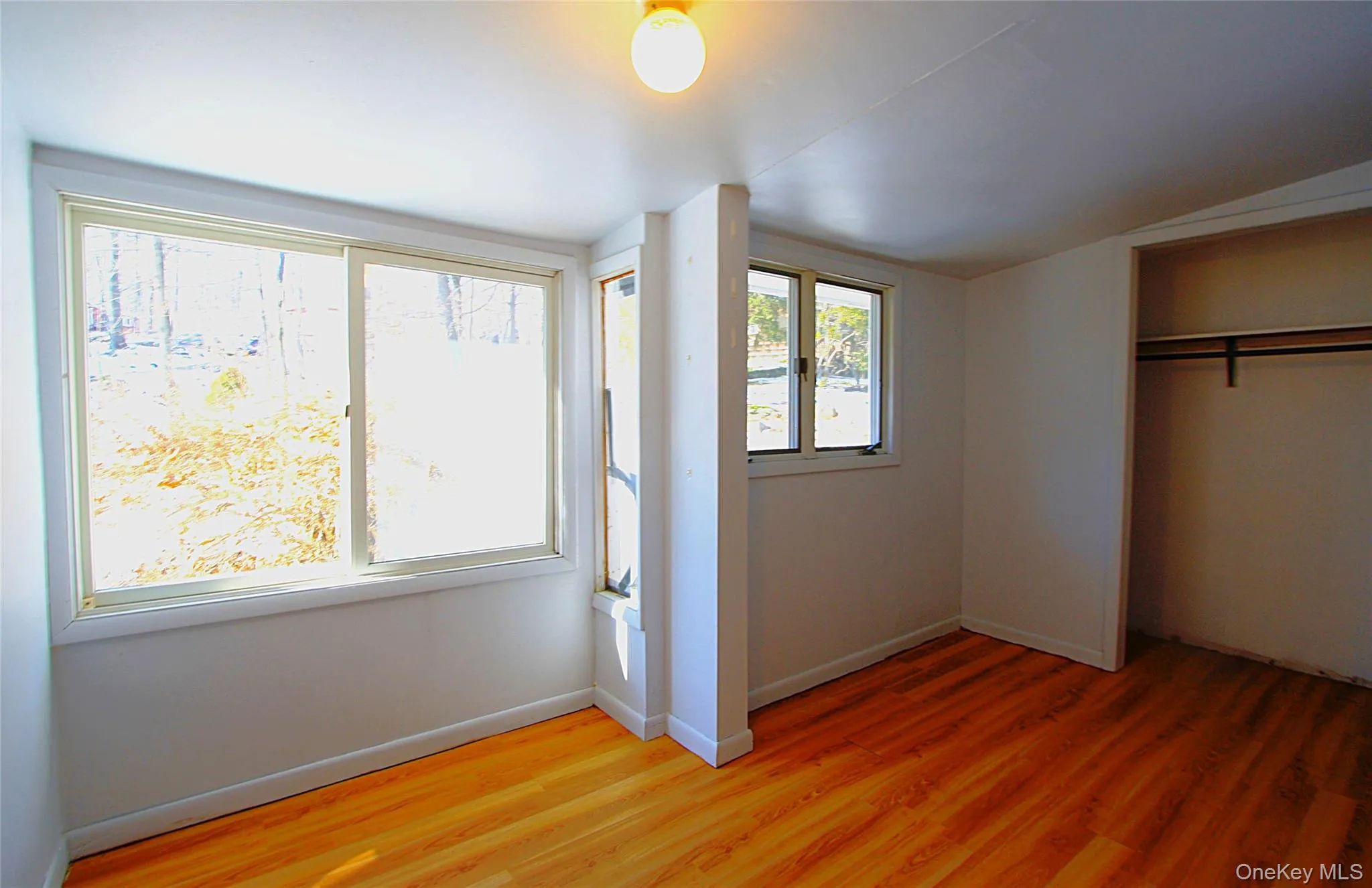 Having nearly a wall of windows, wood floors in great condition and a large closet space, this room will be a huge asset. Having nearly a wall of windows, wood floors in great condition and a large closet space, this room will be a huge asset.