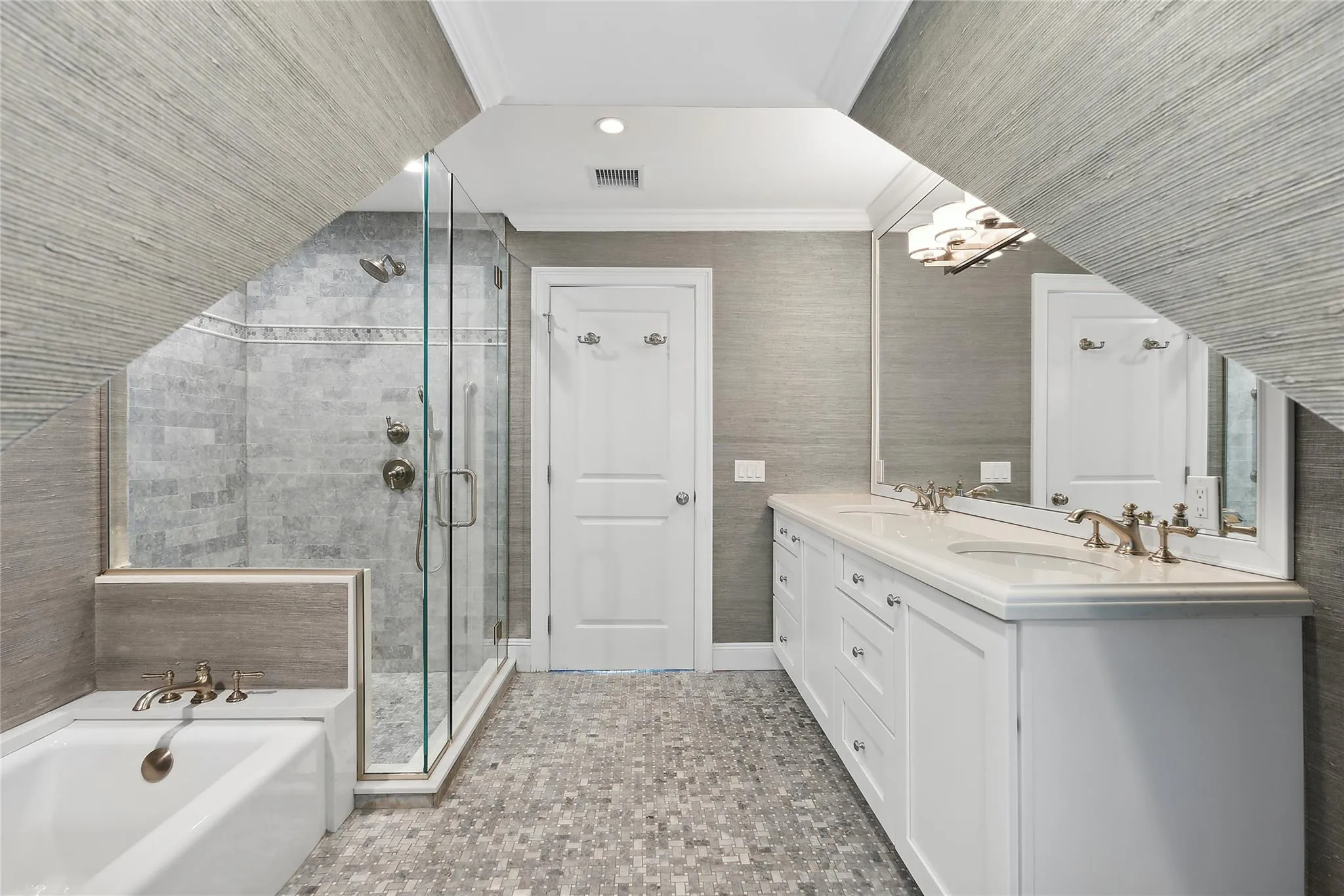 Full bathroom featuring visible vents, a garden tub, ornamental molding, a sink, and a shower stall Full bathroom featuring visible vents, a garden tub, ornamental molding, a sink, and a shower stall