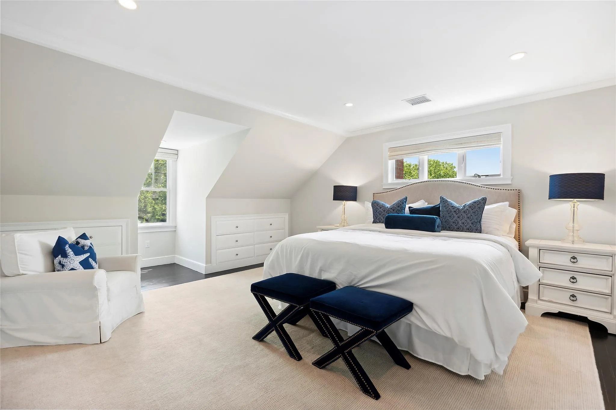 Bedroom featuring vaulted ceiling, recessed lighting, baseboards, and visible vents Bedroom featuring vaulted ceiling, recessed lighting, baseboards, and visible vents